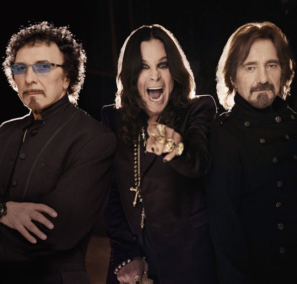 From left: Tommy Iommi, Ozzy Osbourne and Geezer Butler of Black Sabbath in an undated handout photo. The band is releasing "13," its first album of n