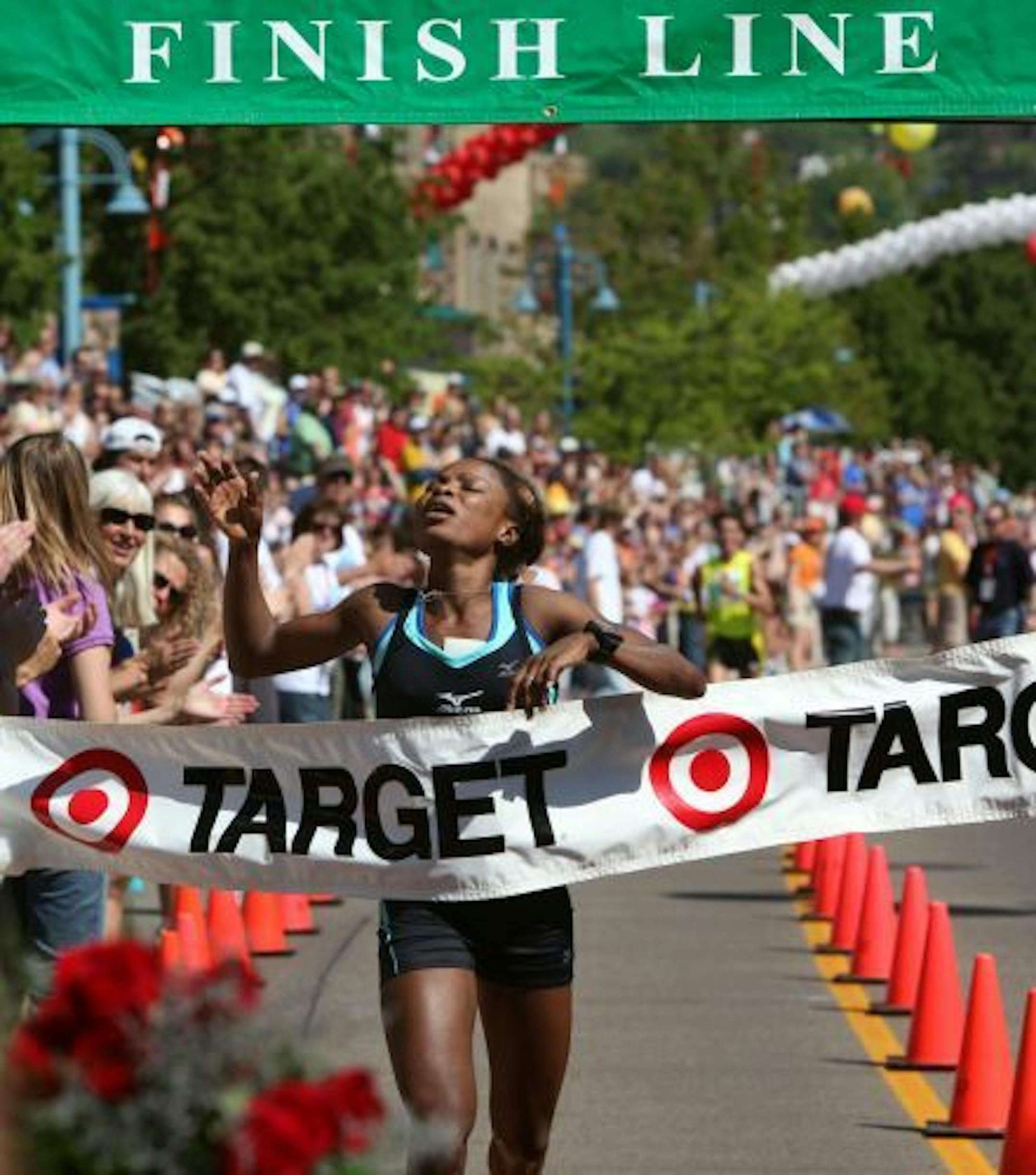 Mary Akor crossed the finish lin at Grandma's Marathon with a winning time of 2:36:52 Saturday in Duluth.