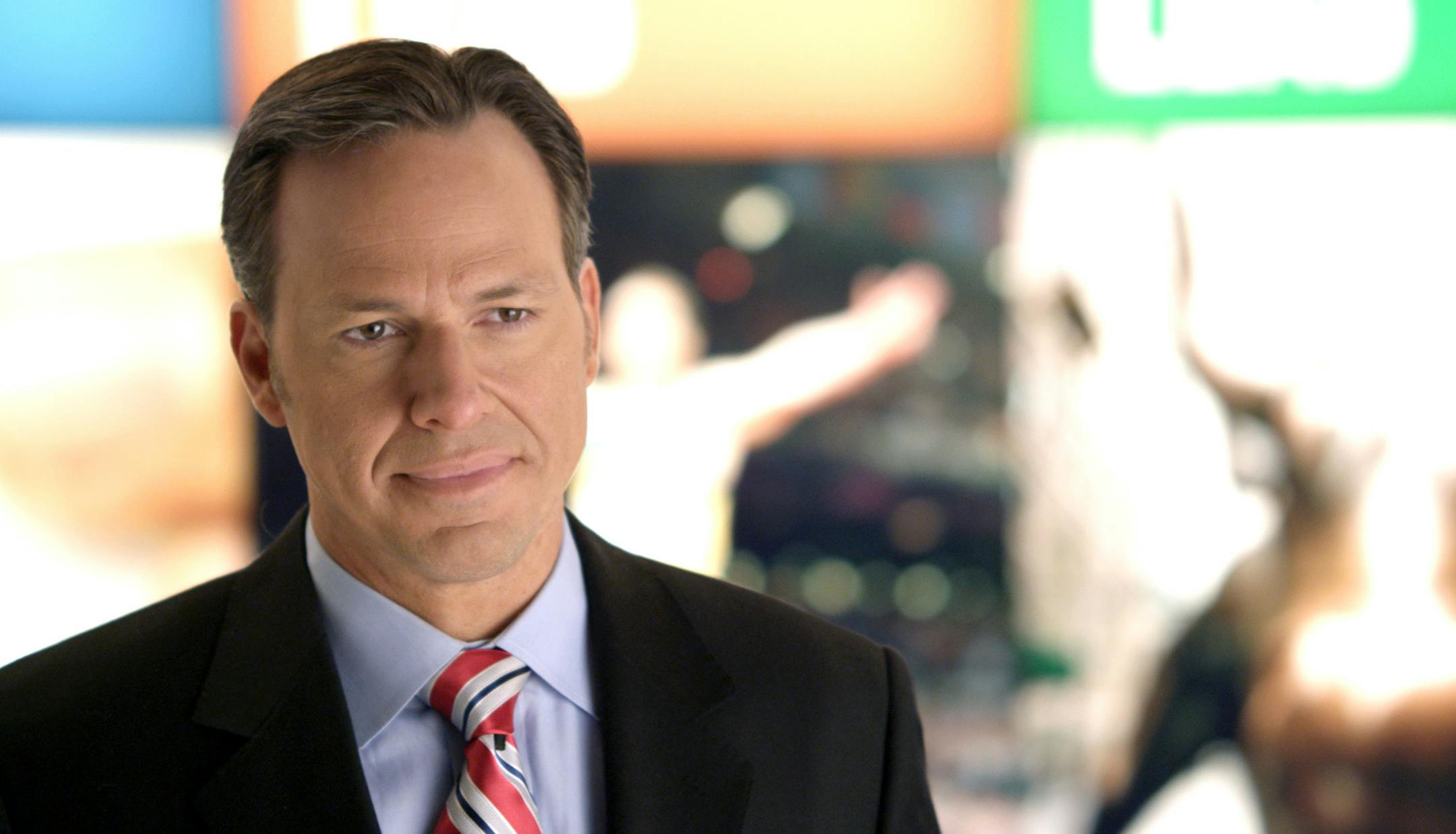 This undated image from video provided by CNN shows Jake Tapper on the set of his show "The Lead with Jake Tapper." Tapper says he wants the show to be a broad look at the news, encompassing business, politics and entertainment. (AP Photo/CNN) ORG XMIT: MIN2013031814444853