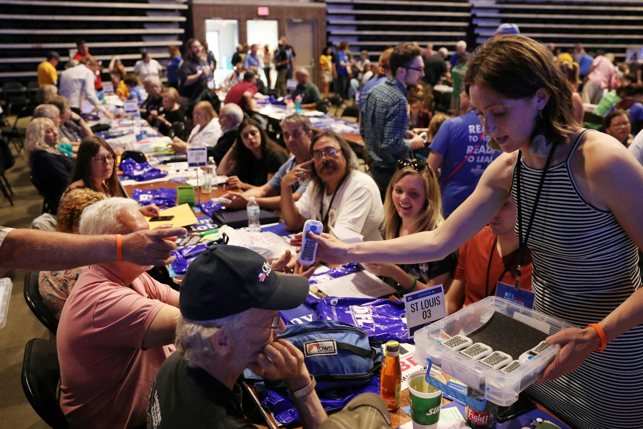 Delegate practiced with their electronic voting devices during the DFL State Convention Friday.