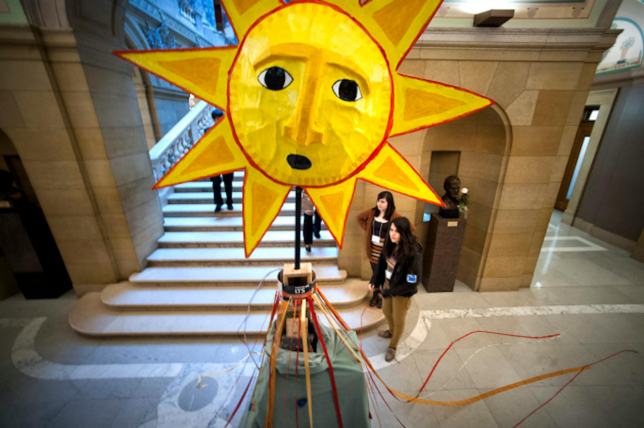 Kate and Audrey Cuthbert set up a sunshine maypole in the State Capitol  Monday, February 25, 2013 as part of youth environmental lobby day.   ]   GLEN STUBBE * gstubbe@startribune.com