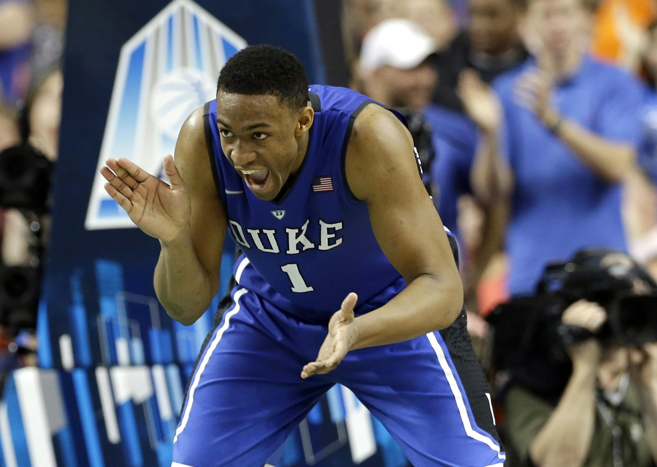 Duke's Jabari Parker celebrated after making a basket against Virginia during the second half of the championship of the Atlantic Coast Conference tournament in Greensboro, N.C.