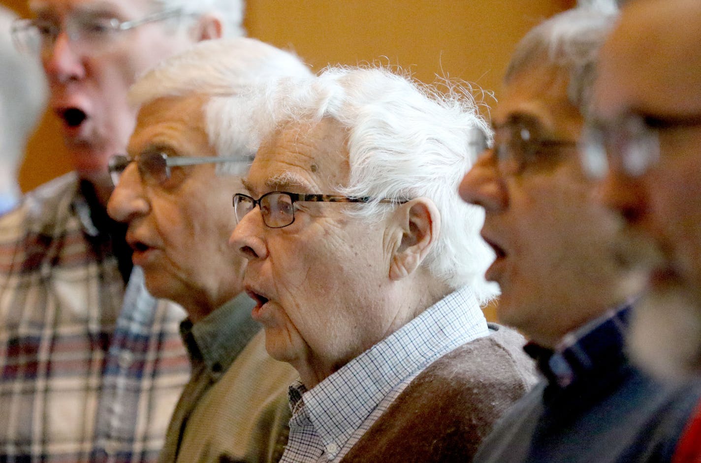 Jack Gray, center, and fellow tenors in Voices of Expression, rehearse for an upcoming concert at the MacPhail Center for Music Tuesday, April 26, 2016, in Minneapolis, MN.](DAVID JOLES/STARTRIBUNE)djoles@startribune.com Voices of Experience, a chorus that's part of a senior music education program at MacPhail Center. Center is teaming up with developer of senior housing to create more arts experiences for retirees.**Jack Gray,cq