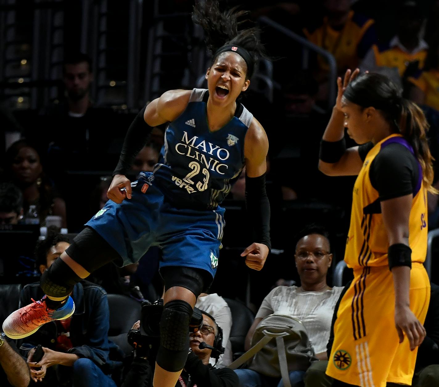 Minnesota Lynx forward Maya Moore (23) celebrated after scoring a layup while being fouled by Los Angeles Sparks forward Candace Parker (3) for an and-one opportunity in the fourth quarter Sunday. ] AARON LAVINSKY &#xef; aaron.lavinsky@startribune.com The Minnesota Lynx played the Los Angeles Sparks in game four of the WNBA Finals on Sunday, Oct. 1, 2017 at Staples Center in Los Angeles, California.