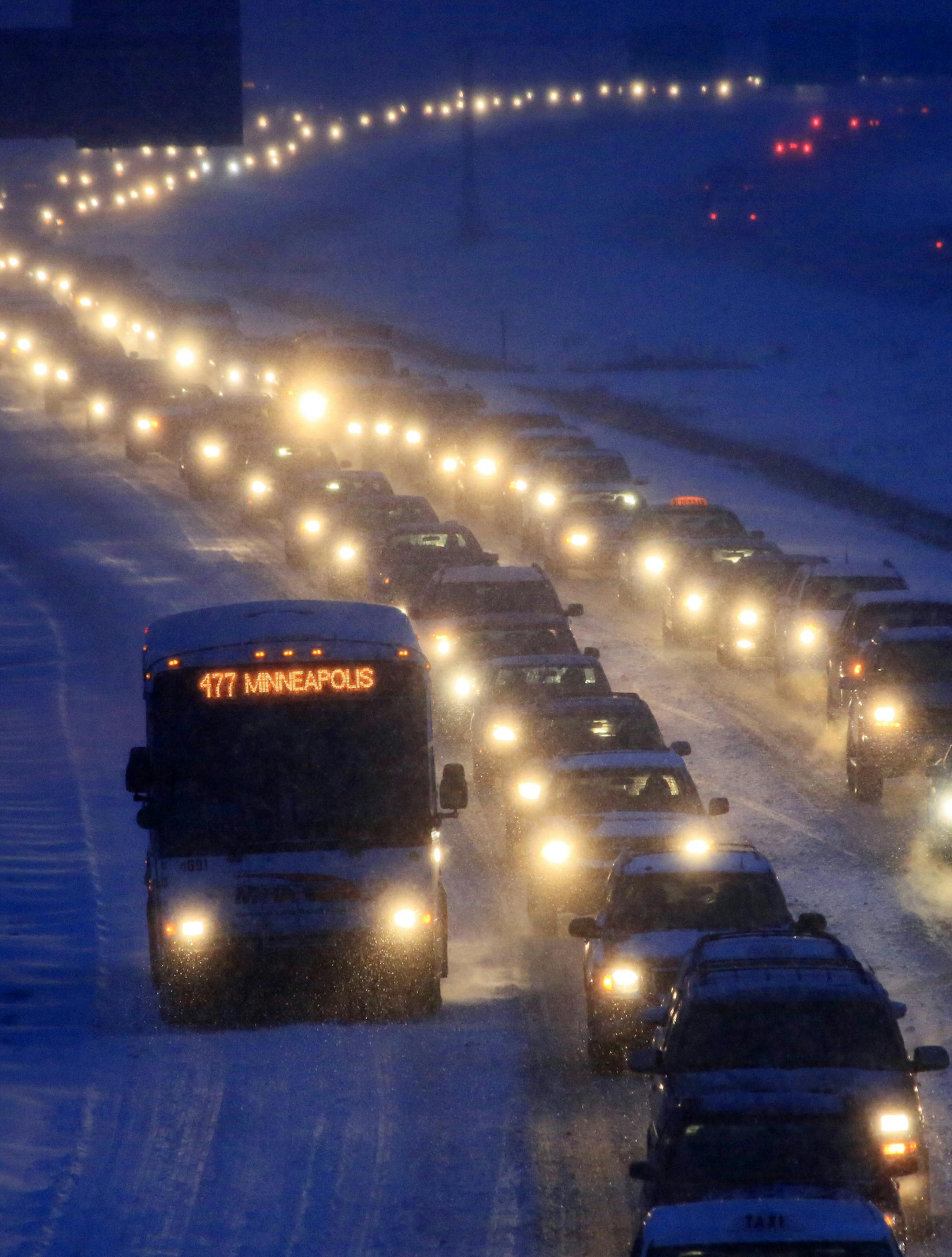With just a few days until spring, mother nature blessed us with another snowy commute. Here morning rush hour was mostly stopped on Cedar Avenue near Cliff Rd. this morning. The State Patrol and the Department of Transportation have closed three roadways because of low visibility. They include Interstate Hwy. 94 from Moorhead to Alexandria, Highway 10 from Moorhead to Audubon and Highway 210 from Breckenridge to Fergus Falls.] Eagen, MN - 03/18/2012