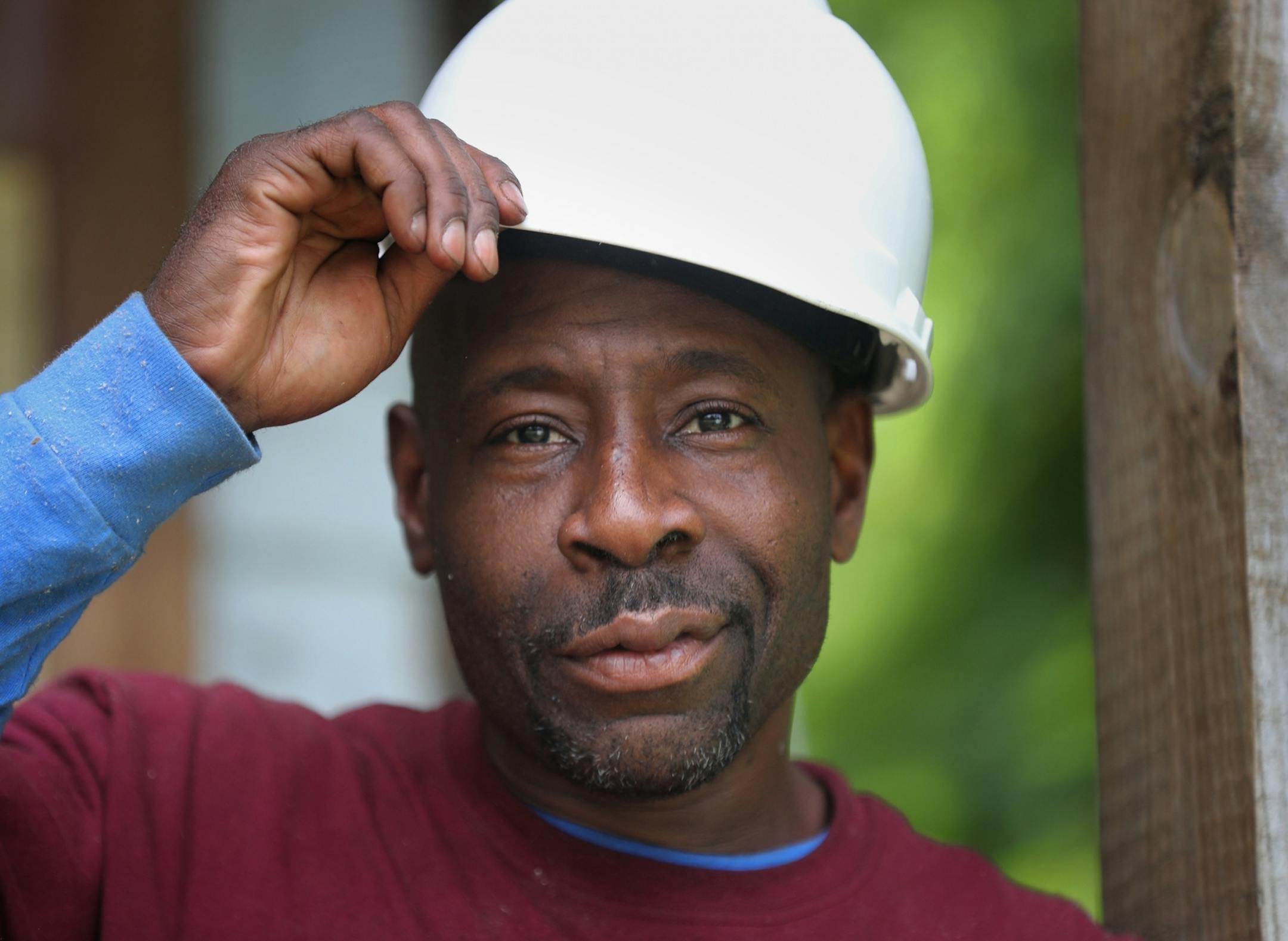 Fred Gurley, is the crew chief for Better Homes Minnesota, a non-profit that assists men in the community in gaining employment while helping protect the environment, and was breaking from disassembling a home Tuesday, July 18, 2017, in Roseville, MN.