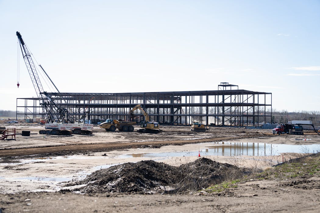 Construction of a 400,000-square-foot building on a 40-acre site for Boston Scientific is underway at a former gravel mining area in Maple Grove on Wednesday.