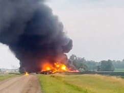 This photo provided by Doug Zink, smoke fills the sky after a train derailment on Friday, July 5, 2024 near Carrington, N.D.   Rail cars containing ha