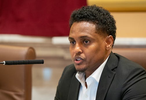 Minneapolis city councilor Jamal Osman speaks during a discussion of a new ordinance raising pay for rideshare drivers.