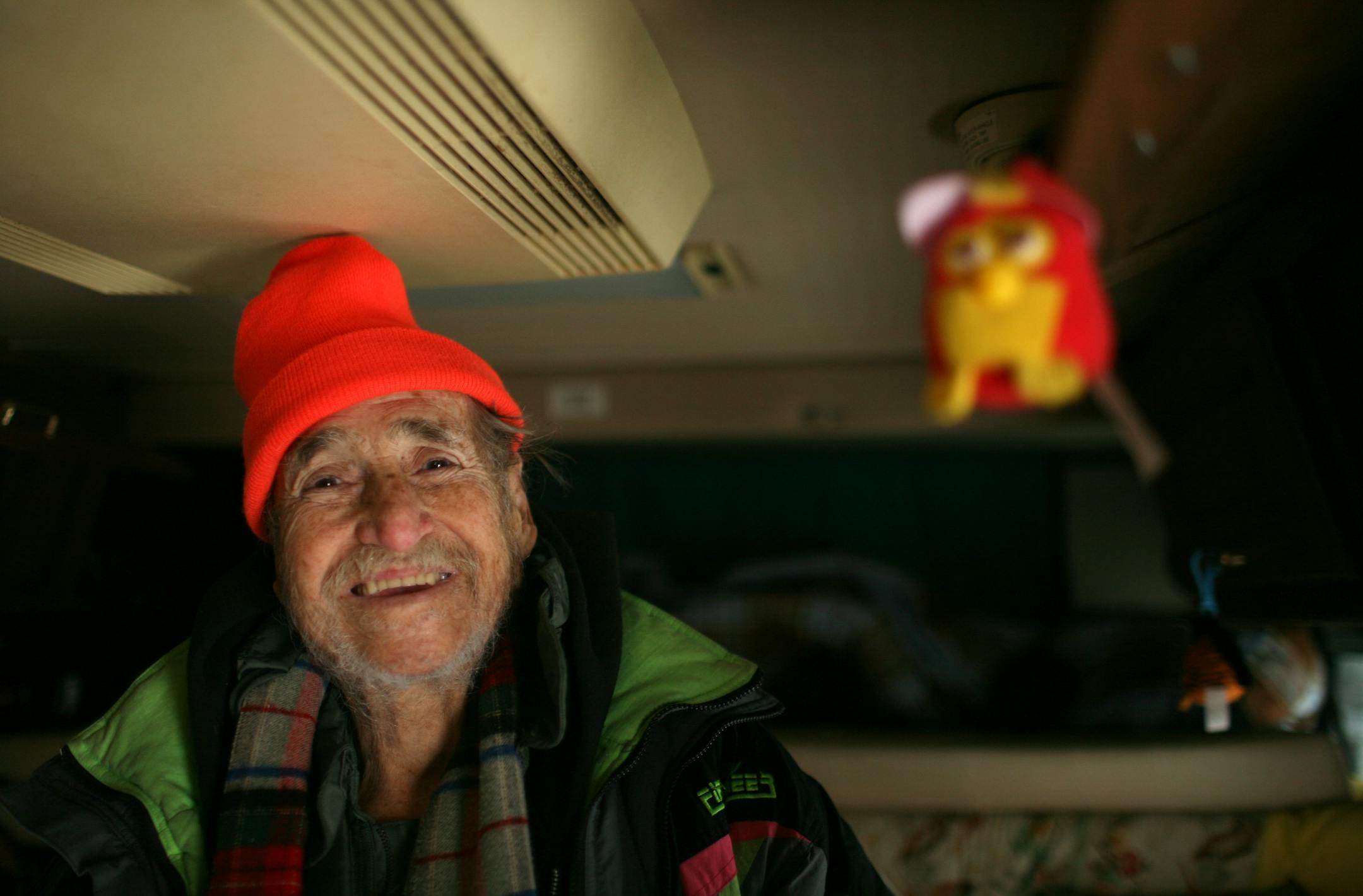 Ed Smith, a homeless WWII veteran, was getting frostbite in this recreational vehicle parked underneath an elevated highway on the north edge of downtown Minneapolis until an outreach worker from St. Stephen's Human Services persuaded him to come to a shelter.