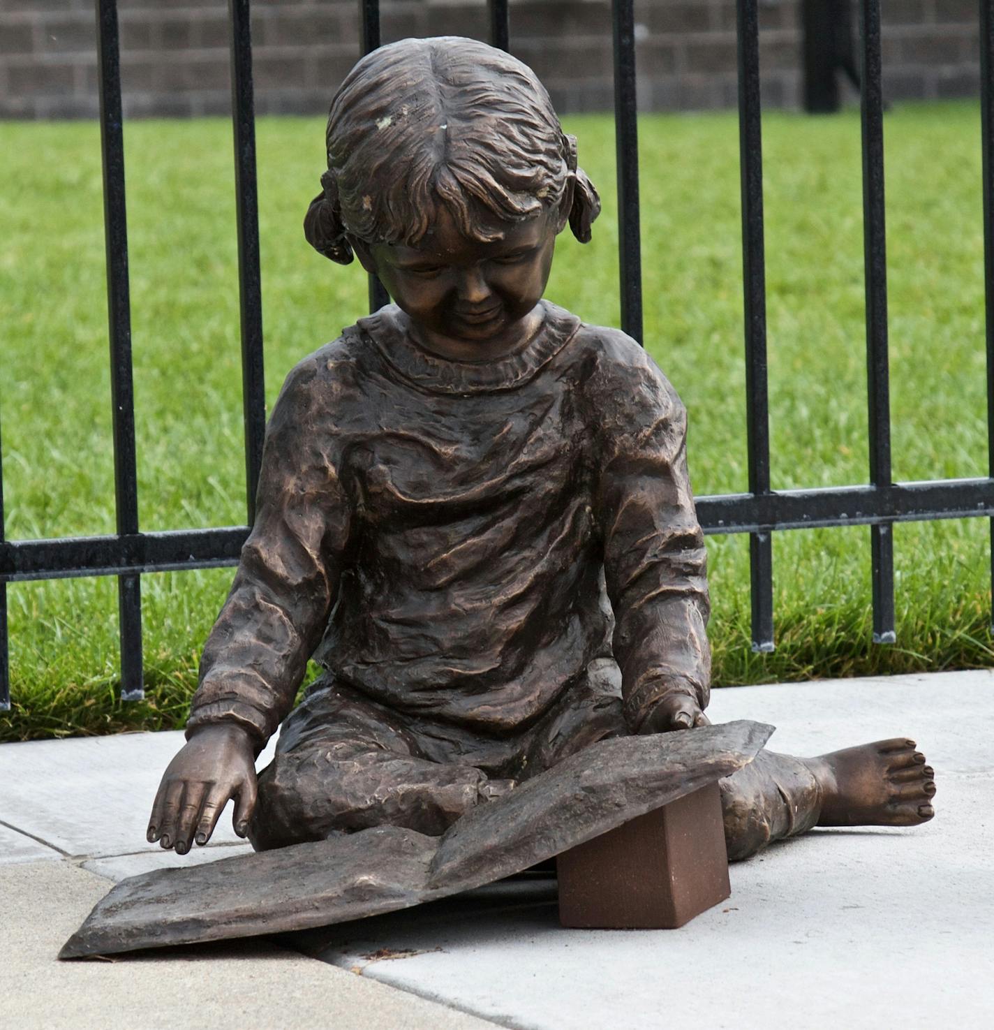 Concordia, Kan., is putting up several statues of orphans like this one of a young Miriam Zitur, who rode the rails from New York City to a new home. (Bruce N. Meyer/Chicago Tribune/TNS) ORG XMIT: 1194232