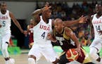 Jimmy Butler defended against Venezuela's Gregory Vargas in the U.S. men's basketball team's 113-69 victory Monday in the Rio Olympics.