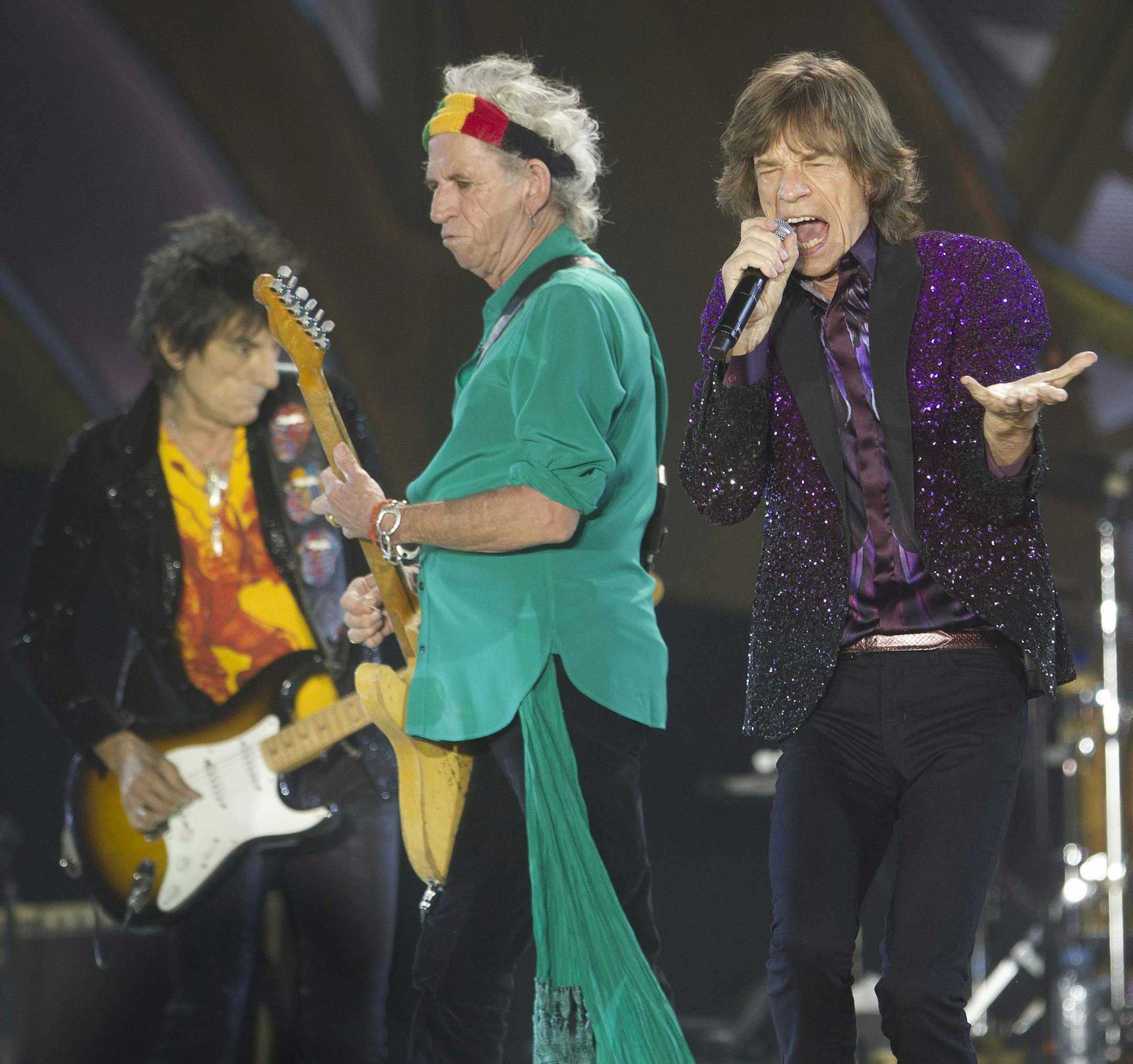 FILE - In this June 4, 2014, file photo, Rolling Stones singer Mick Jagger, performs with Keith Richards, second left, Ronnie Wood, left, and drummer Charlie Watts during a concert in Hayrkon Park in Tel Aviv, Israel. The Stones will kick off a 15-city stadium tour of North America on May 24 at Petco Park in San Diego, Calif. (AP Photo/Ariel Schalit, File)