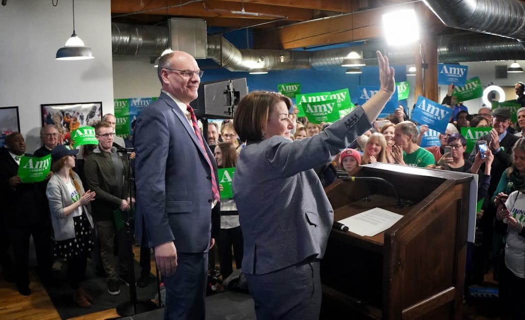 As results from Nevada trickled in, Sen Amy Klobuchar and her husband, John Bessler, greeted volunteers Saturday night at her Minneapolis campaign headquarters before heading to a fundraiser to replenish her campaign coffers. 