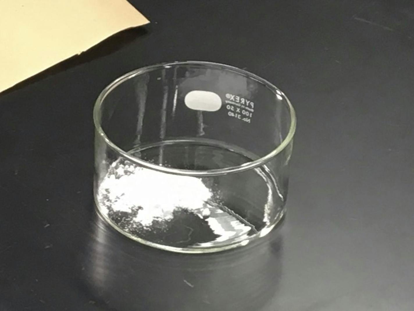 In this photo released by the US Drug Enforcement Agency, DEA, and taken on Oct. 21, 2016, a sample of carfentanil is being analyzed at the DEA�s Special Testing and Research Laboratory in Sterling, Va. China is adding the deadly elephant tranquilizer carfentanil and three related synthetic opioids to its list of controlled substances effective March 1, China's National Narcotics Control Commission said Thursday.