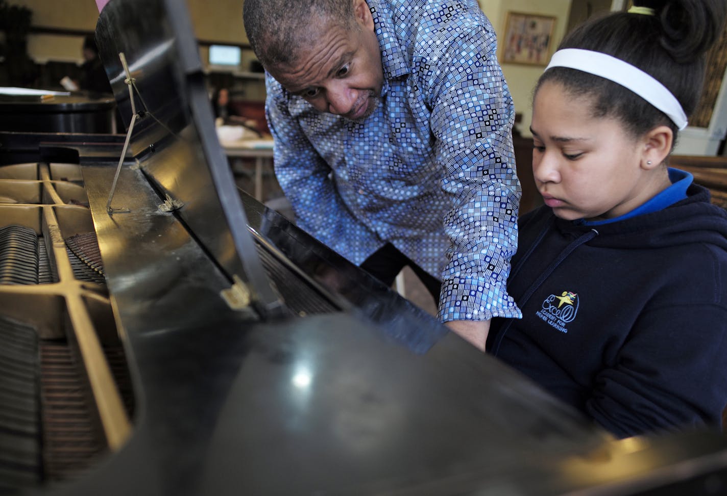 William Duncan was giving a lesson to Joshuyan Williams. Williams takes lessons along with her older brother Jacob. They come all the way from Maple Grove because of Walker West Music Academy's reputation.]richard.tsong-taatarii/rtsong-taatarii@startribune.com