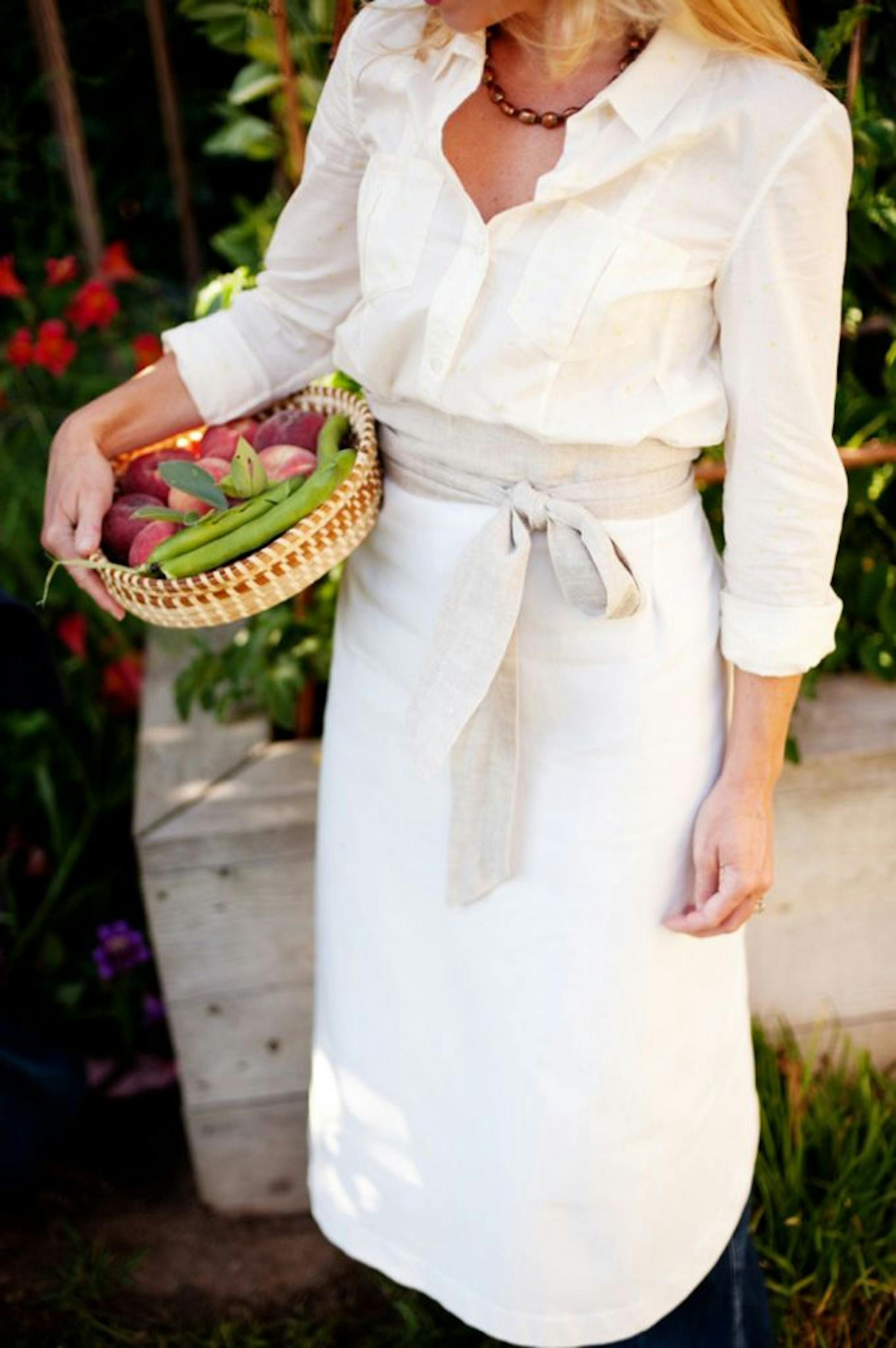 Valerie Rice's line of aprons includes the "Garden" style. She uses white denim and linen to create a chic look.