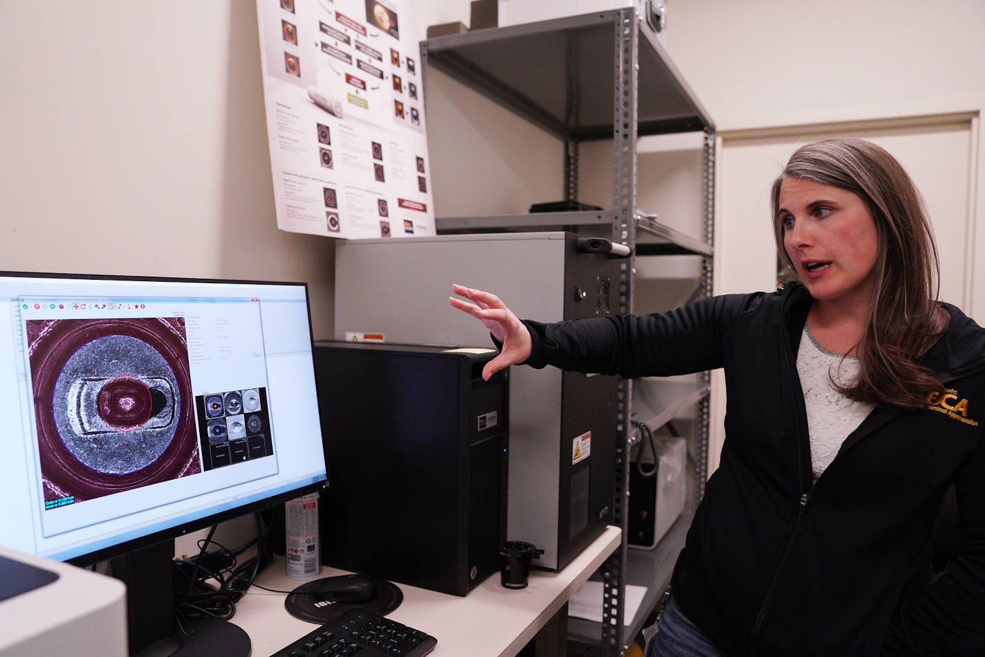 BCA forensic scientist Ashely Fetch gave a demonstration on how the agency uses NIBIN technology to trace guns to bullets Wednesday. ] ANTHONY SOUFFLE • anthony.souffle@startribune.com Officials from the Bureau of Criminal Apprehension gave a demonstration of how they use NIBIN technology to trace guns to bullets Wednesday, Nov. 6, 2019 at the BCA office building in St. Paul, Minn. NIBIN is a national database of digital images of spent bullets and cartridge cases either found at crime scenes or