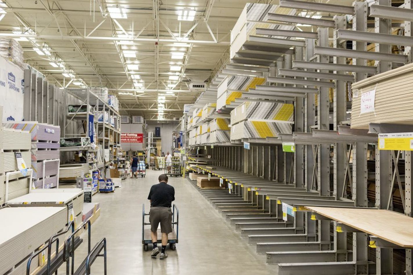 Near-empty shelves of plywood and other supplies at a Lowe's home improvement store in Jensen Beach, Fla., Sept. 7, 2017. Hurricane Irma struck the northeast Caribbean with terrifying force Wednesday, its battering rain and winds of up to 185 miles per hour leaving a trail of chaos, wreckage and flooding from Barbuda to Puerto Rico, before taking aim at islands farther west and, beyond them, Florida.