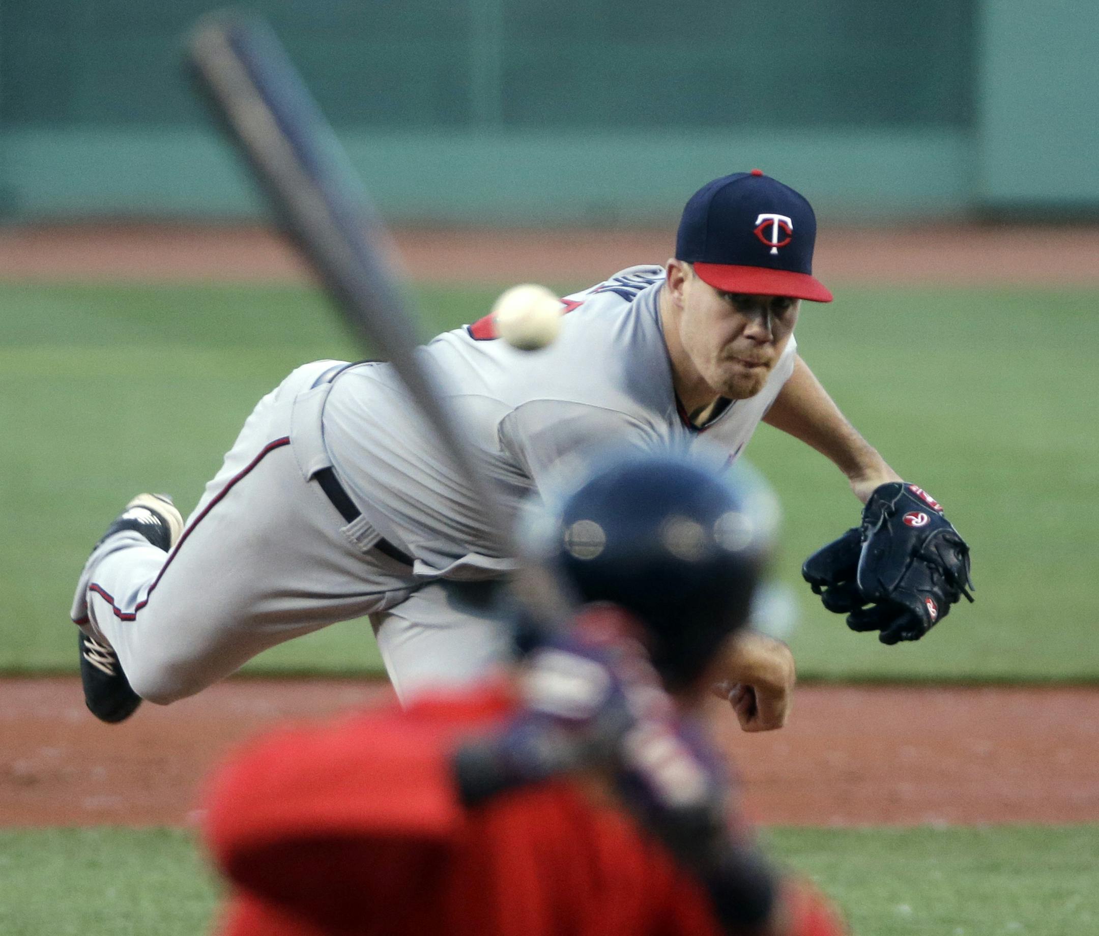 Minnesota Twins starting pitcher Trevor May delivers to Boston Red Sox's Dustin Pedroia in the first inning of a baseball game at Fenway Park in Boston, Wednesday, June 3, 2015. (AP Photo/Elise Amendola) ORG XMIT: MIN2015060321112569