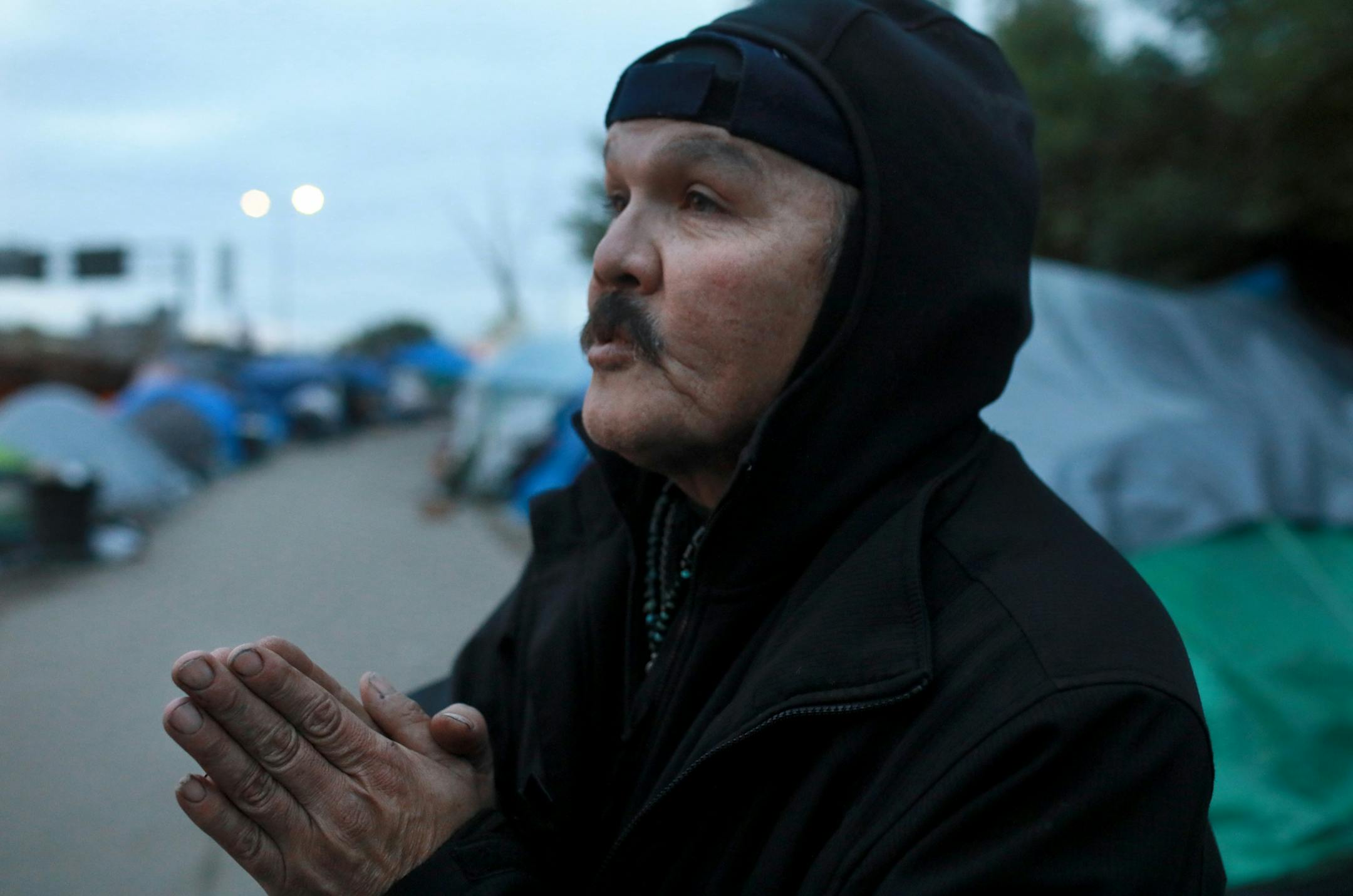 Summer has quickly changed to fall, with temps plummeting at the Hiawatha homeless encampment. Here, Desi Gokey, 54, is a musician and a Native American spiritual leader and was seen at the camp Thursday, Oct. 11, 2018, in Minneapolis, MN. "This is our Standing Rock," Gokey said. "You can get stronger out here if you push away all the negative spirits."