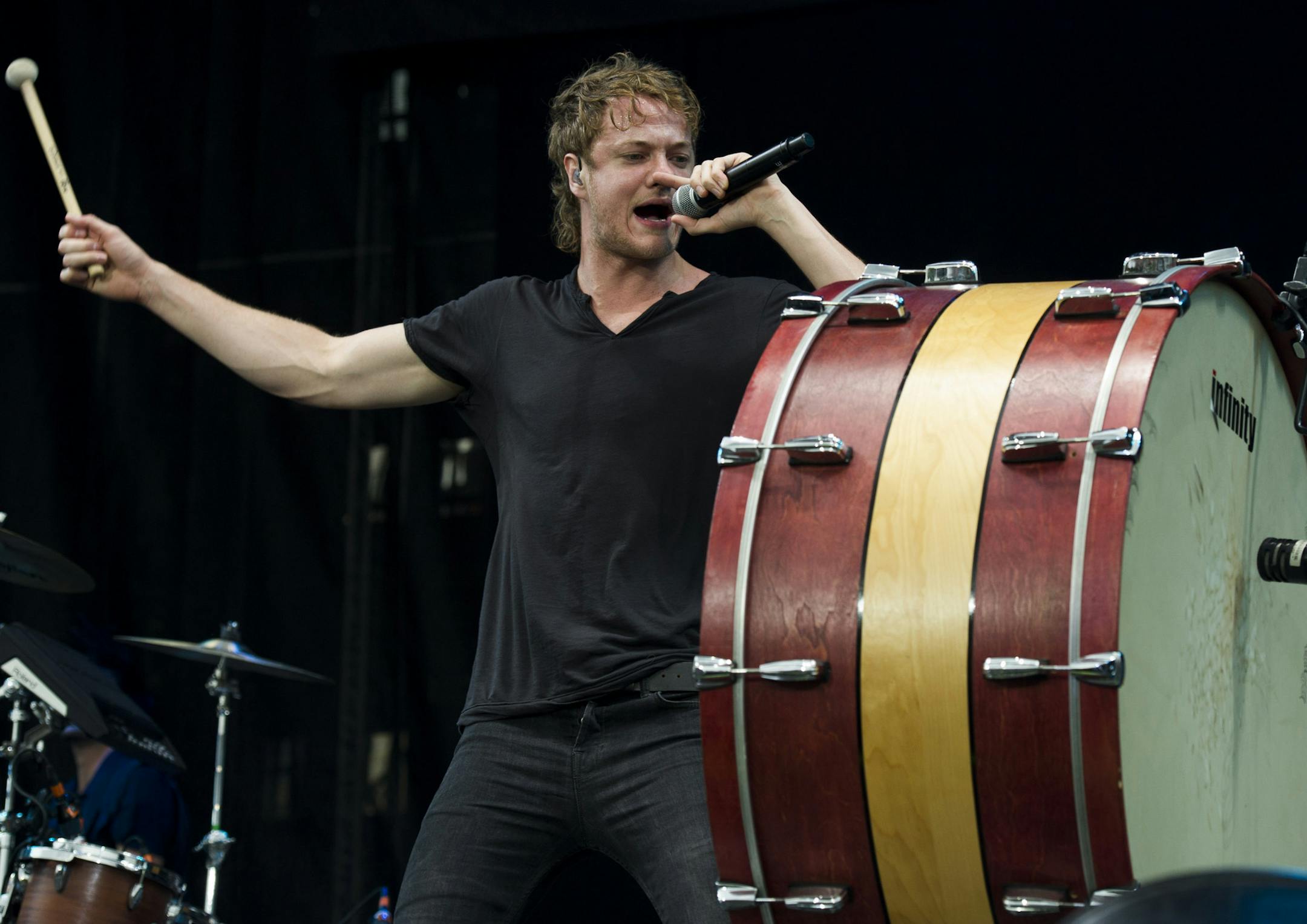 Dan Reynolds from the band Imagine Dragons performs on Day 1 of the 2013 Budweiser Made in America Festival, Saturday, Aug. 31, 2013, in Philadelphia. (Photo by Charles Sykes/Invision/AP) ORG XMIT: MIN2013092514351957