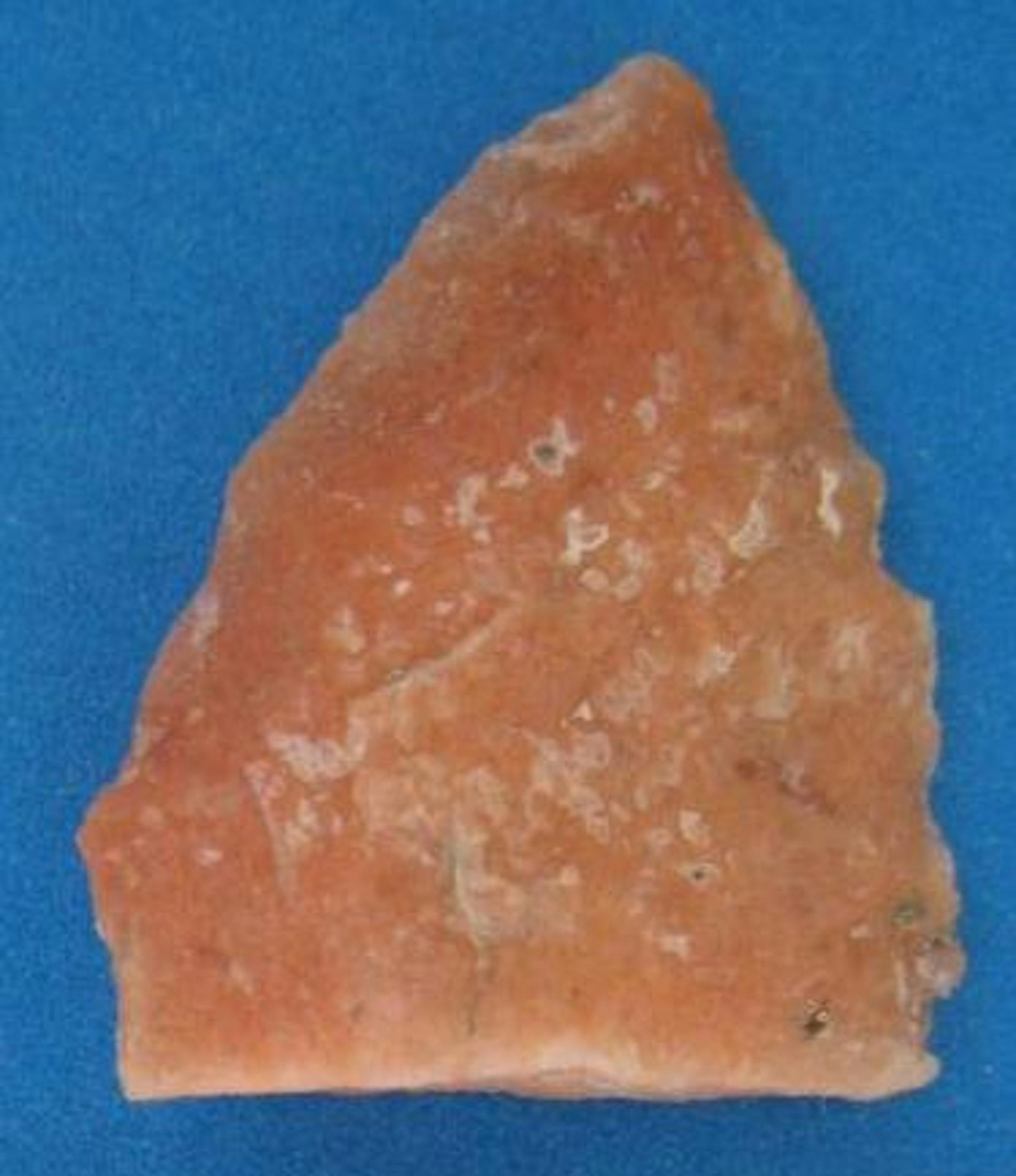 Spear point tip and grater found at archaeological site at construction site on the Minnesota River.