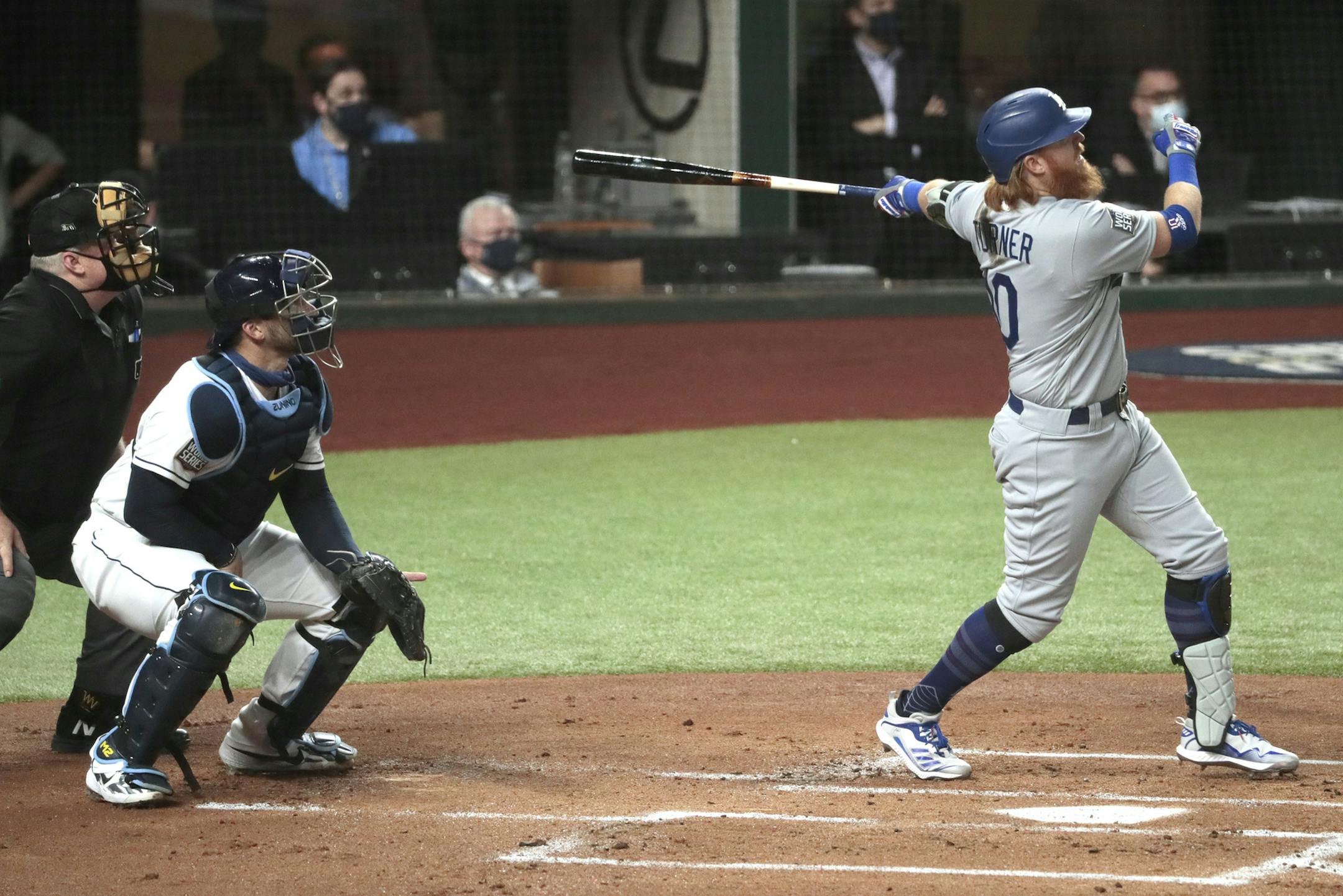 Los Angeles Dodgers third baseman Justin Turner (10) homers in the first inning against Tampa Bay Rays starting pitcher Charlie Morton (50) in Game 3 of the World Series on Friday, Oct. 23, 2020 at Globe Life Field in Arlington, Texas. (Robert Gauthier/Los Angeles Times/TNS)