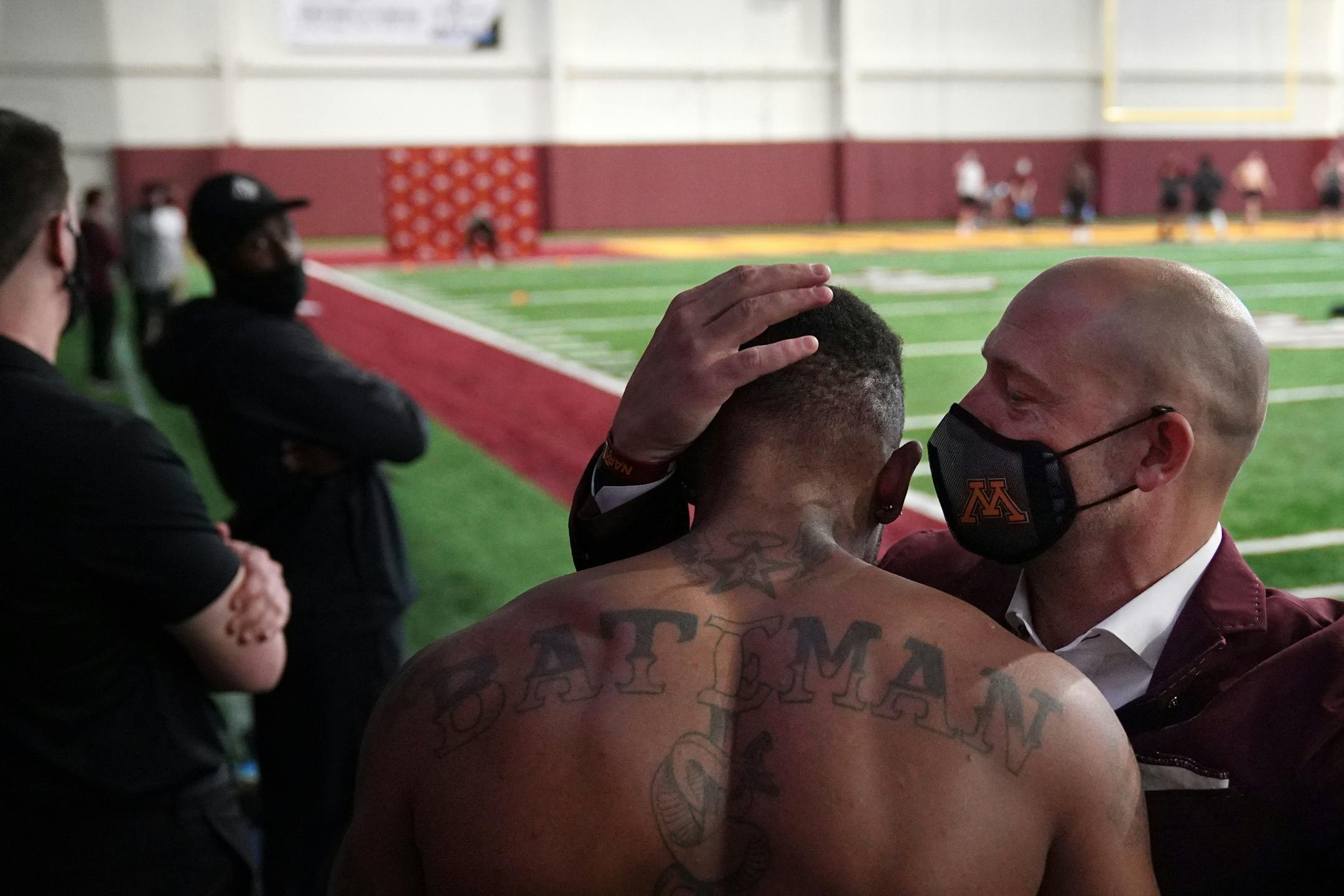University of Minnesota head football coach P.J. Fleck gave a hug to wide receiver Rashod Bateman during Pro Day.