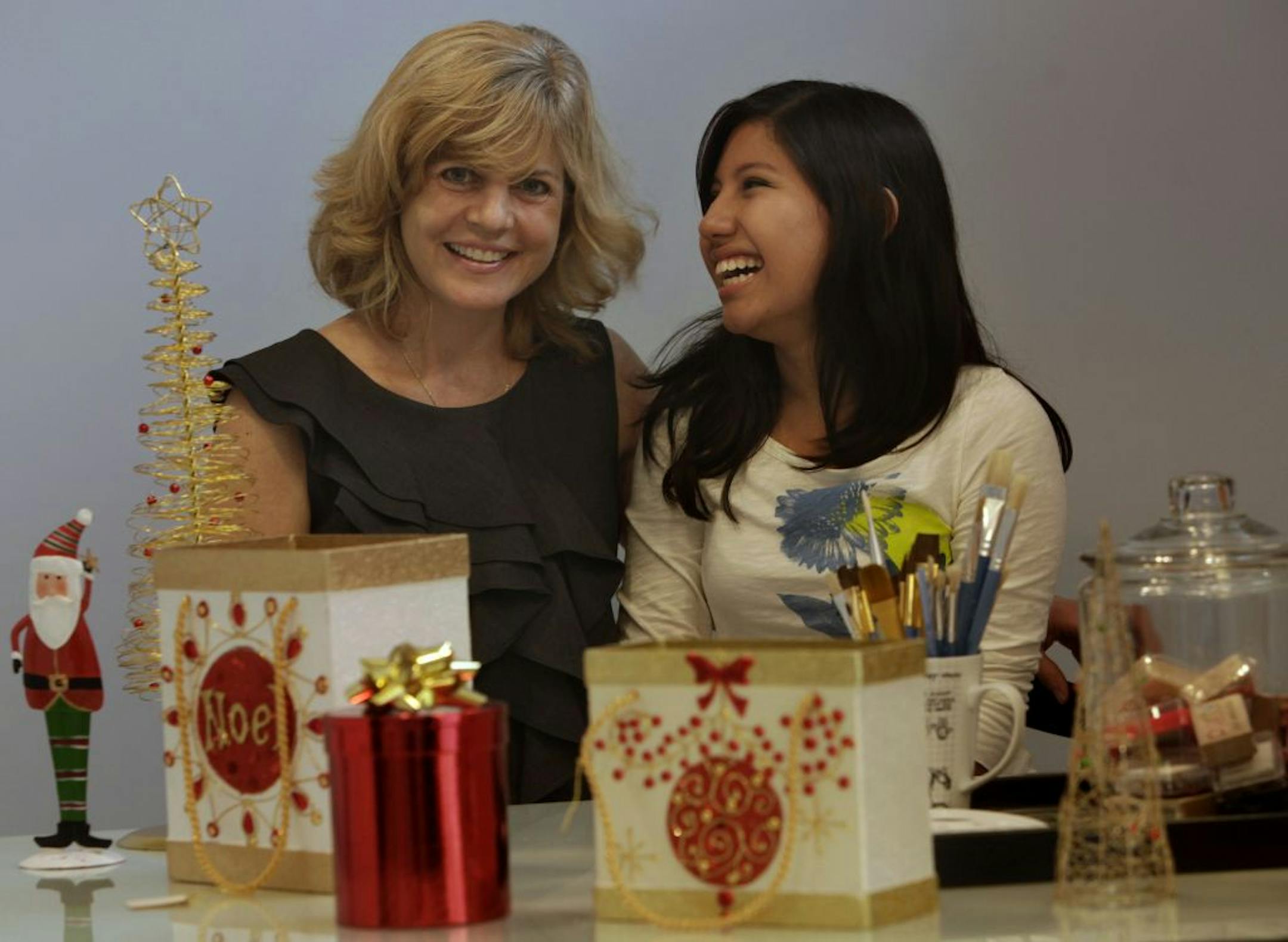 Julie Overbye Ledy and her daughter Jullian Ledy in the craft room.
