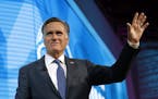 FILE - In this Jan. 19, 2018,, file photo, former Republican presidential candidate Mitt Romney waves after speaking about the tech sector during an i