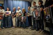 Families of people who died of fentanyl overdoses stood together during a news conference about the drastic increase in fentanyl deaths in Hennepin Co