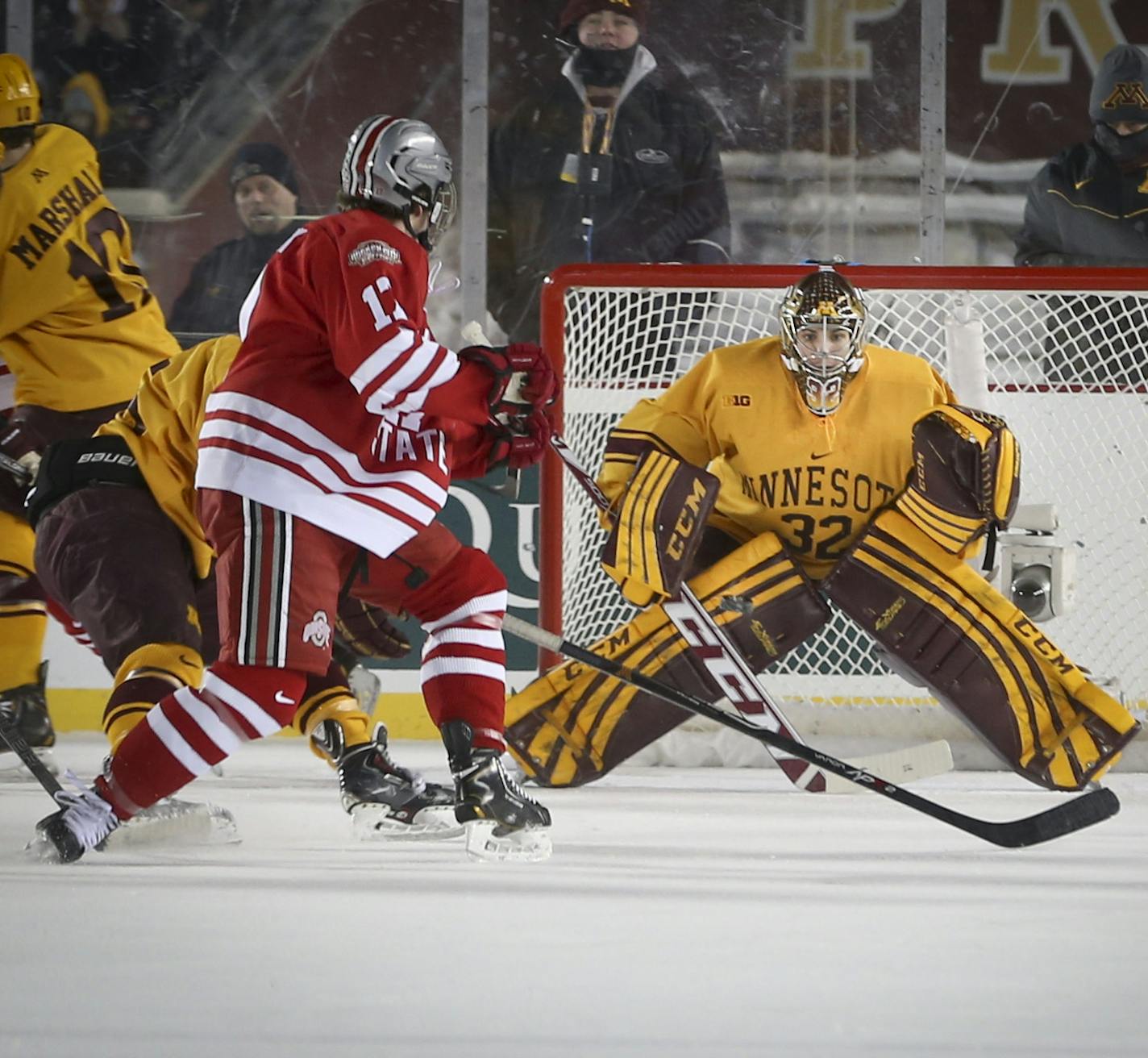 Minnesota goalie Adam Wilconx blocked a shot on goal by Ohio's Max McCormick in the first period during the Minnesota Gophers men's hockey vs. Ohio State Hockey City Classic game outdoors at TCF Bank Stadium on Friday, January 17, 2014. ] (RENEE JONES SCHNEIDER reneejones@startribune.com)