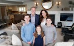 Homeowners Dario and Jeanne Anselmo with Andrew, Ali and Aidan, gave 23 interior designers a blank canvas to turn their Edina rambler into the ASID MN