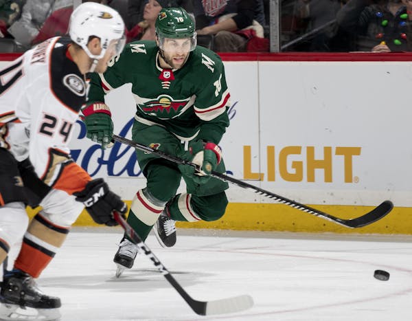 Jason Zucker (16) of the Minnesota Wild skates with puck in the second period against the Anaheim Ducks on Tuesday, Dec. 10, 2019 at Xcel Energy Cente