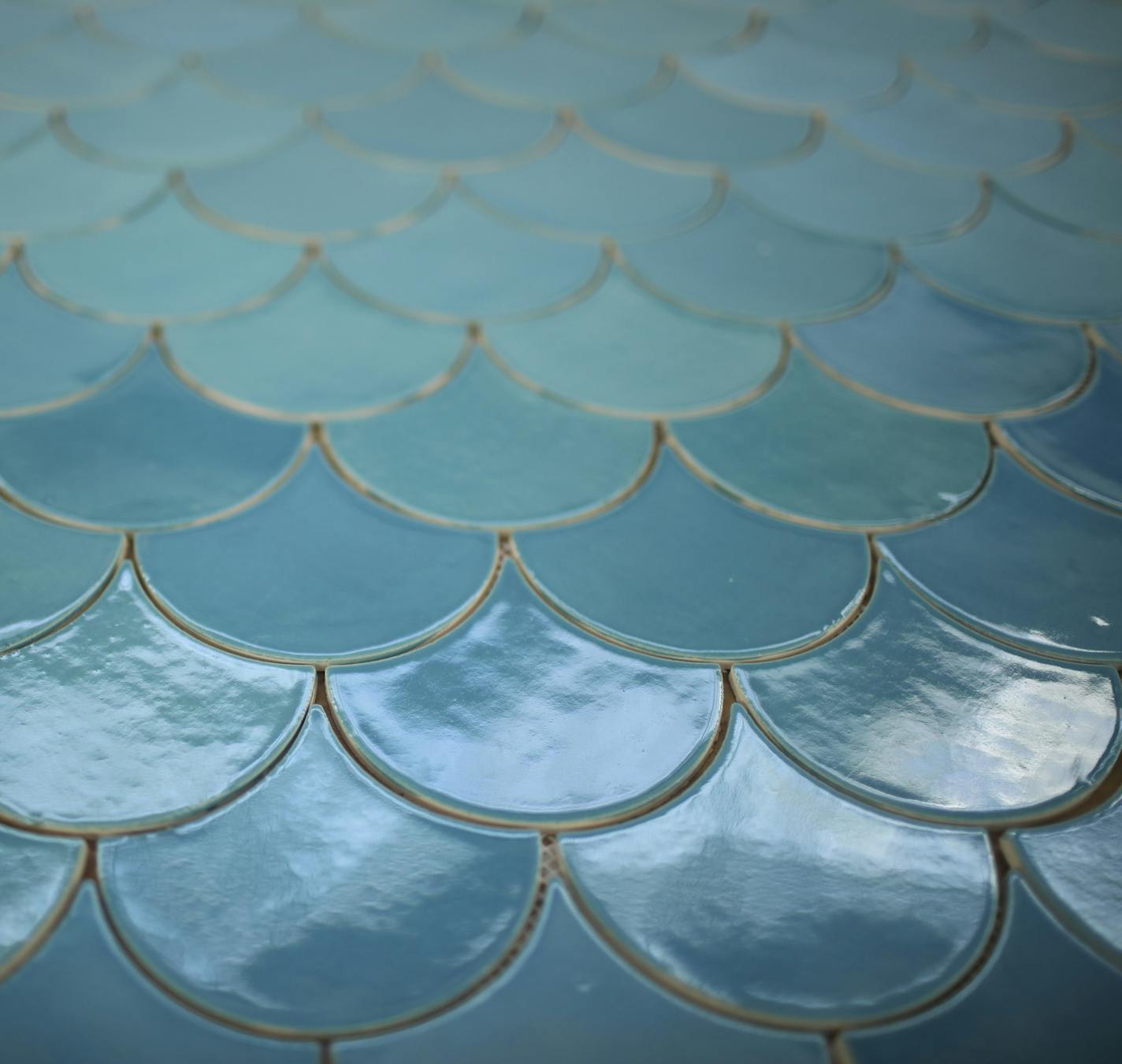 An array of Mercury Mosaics' signature Moroccan Fish Scale tiles shows the subtle variation of a product made by hand in small batches. ] JEFF WHEELER &#xef; jeff.wheeler@startribune.com The tile maker Mercury Mosaics is up and running in their new Thorp Building location in Northeast, though finish work on their new space is still yet to come. The business and founder Mercedes Austin were photographed Wednesday afternoon, August 23, 2017 in Minneapolis.