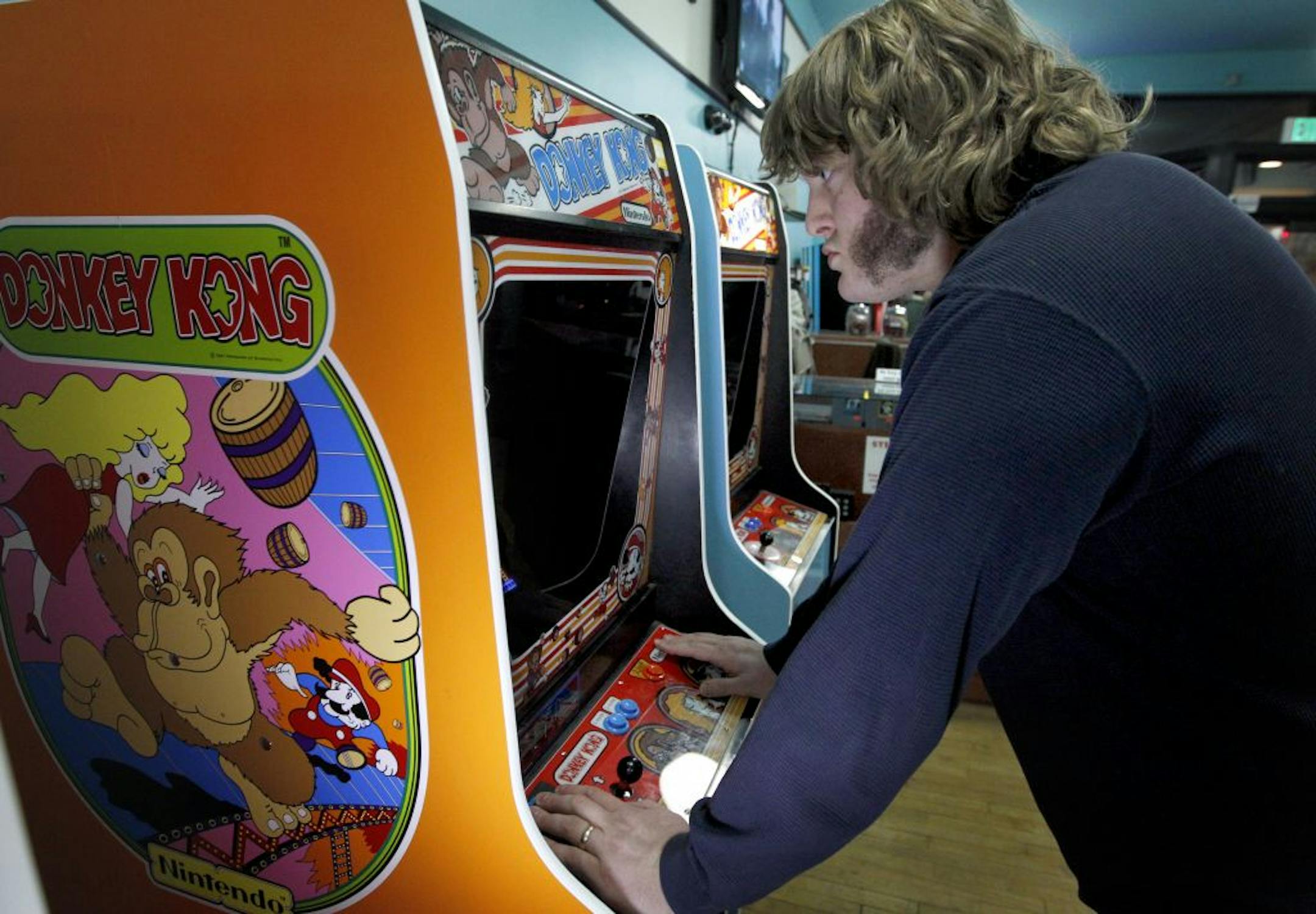 Mitchell Elliott is a self-described "nerdy jock." The 300-pound offensive lineman is a regular at Rusty Quarters, where he's made friends with other "Donkey Kong" fanatics.