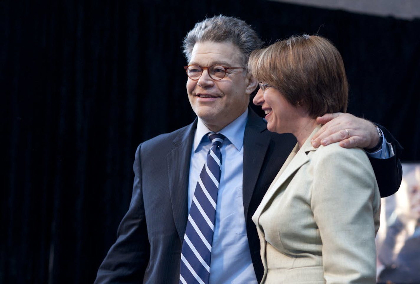 Sens. Al Franken and Amy Klobuchar, shown together in 2011, voted against efforts to defund Planned Parenthood.