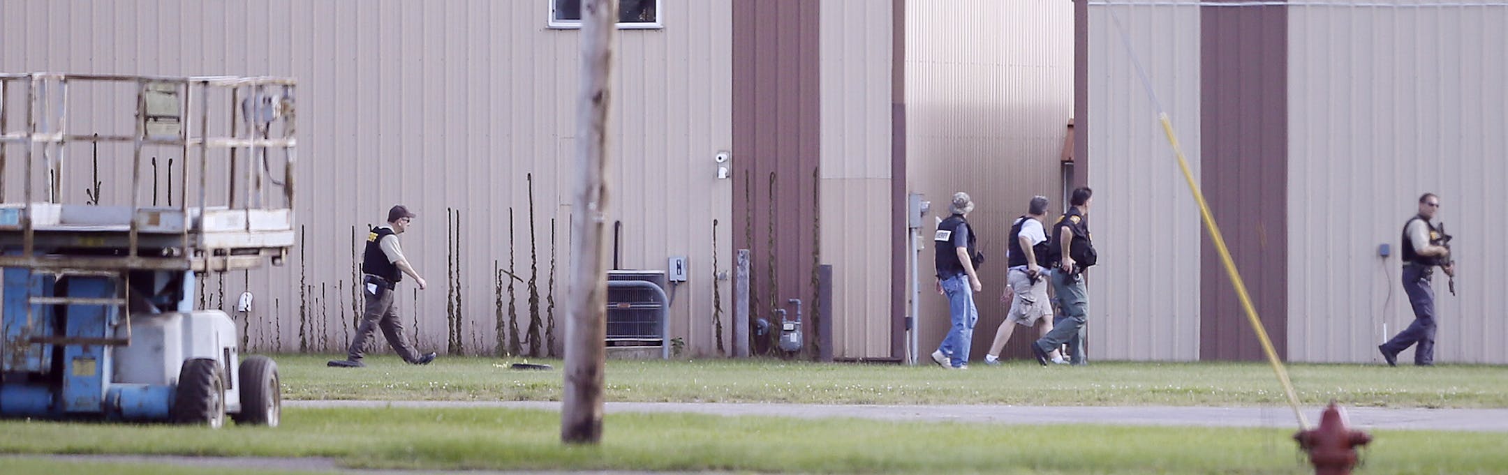 Ramsey County deputies searched hangars Monday at the Anoka County-Blaine Airport for alleged murderer Lyle “Ty” Hoffman.