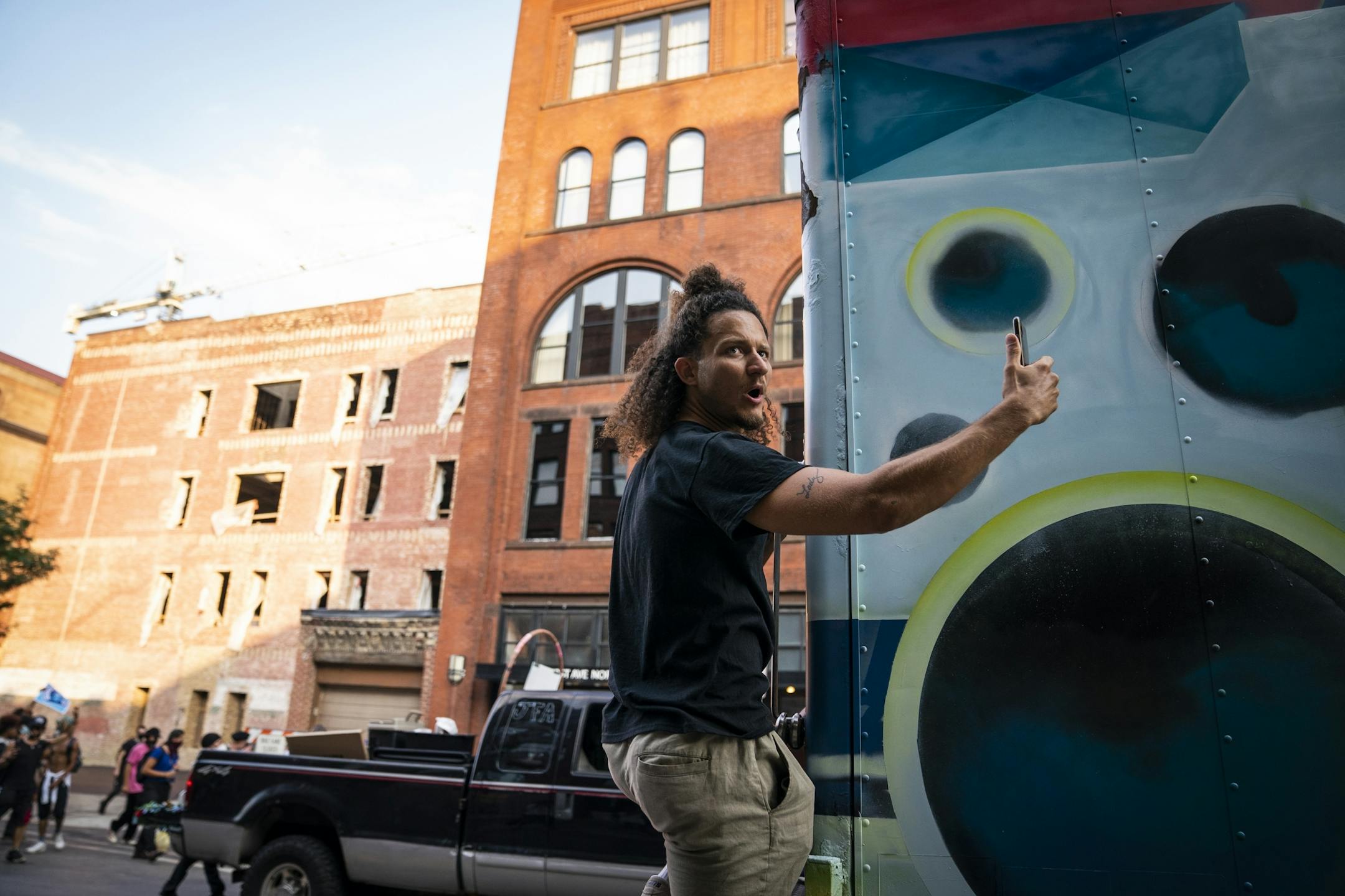 Protesters marched downtown to the Minneapolis Police Department's First Precinct.