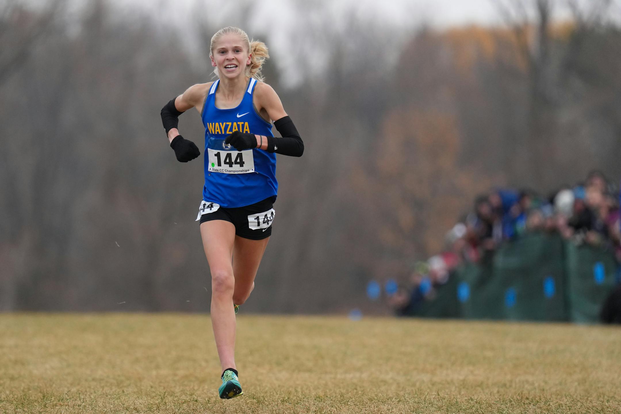 Abbey Nechanicky of Wayzata approaches the finish line.