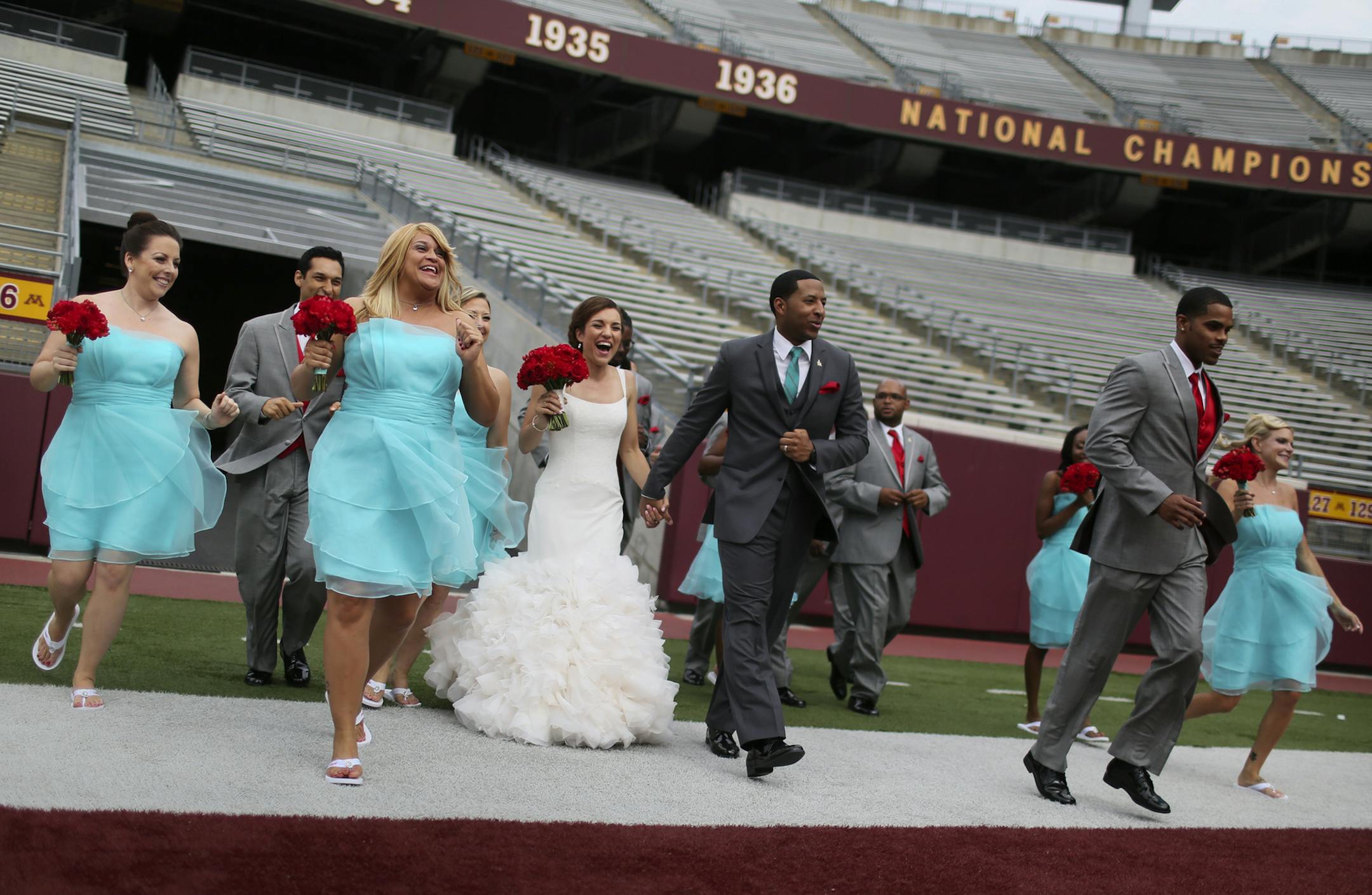 The July 6 wedding procession for bride Samantha Dean and groom Desmond Jones began at TCF Bank Stadium’s Indoor Club Room before adjourning through the stadium tunnel and onto the turf football field.