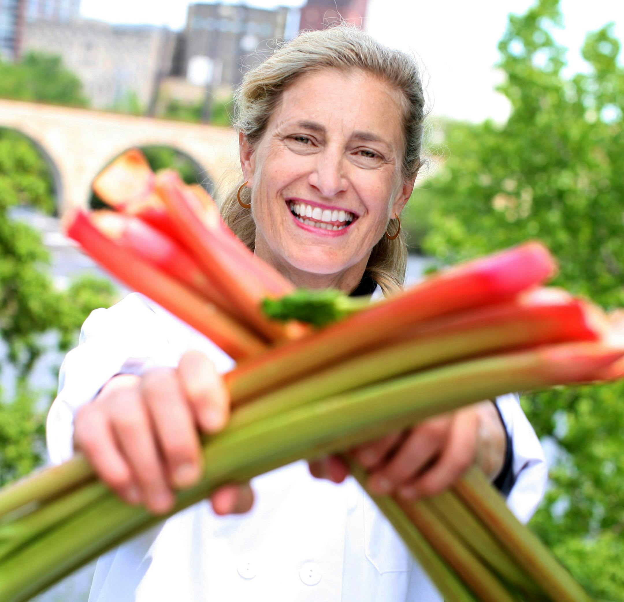 Chef Lucia Watson, proprietor of Lucia‚Äôs Restaurant, Wine Bar, and Lucia‚Äôs To Go, strikes a power pose with rhubarb in downtown Minneapolis May 24, 2013. (Courtney Perry/Special to the Star Tribune)