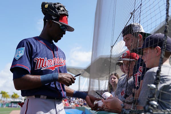 Minnesota Twins shortstop Nick Gordon (1) signed autographs for a group of young fans before Sunday's game. ] ANTHONY SOUFFLE &#x2022; anthony.souffle