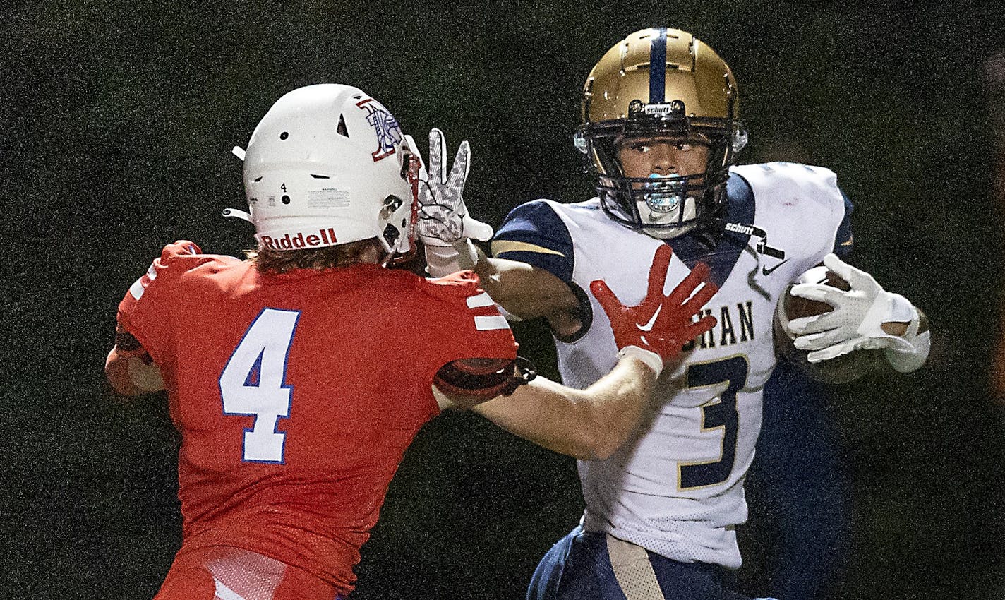 Chanhassen's Maxwell Woods (3) beats Robbinsdale's Nick Brandner to the end zone for a touchdown in the third quarter at Robbinsdale Armstrong High School in Plymouth, Minn., on Friday, Sept. 30 2022. ] Elizabeth Flores • liz.flores@startribune.com ORG XMIT: MIN2209302134410149