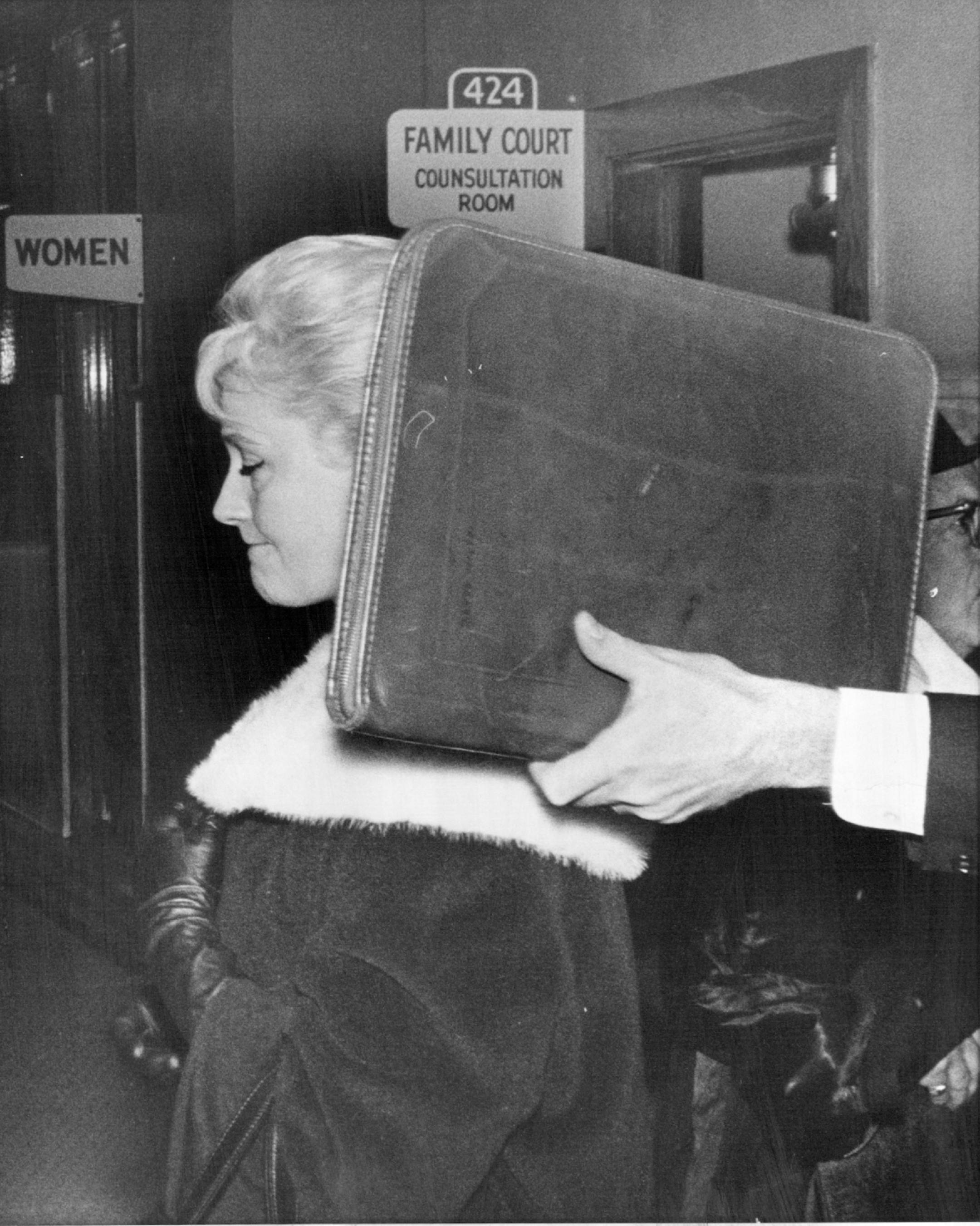 December 6, 1963 Mrs. Eve Mastrian, wife of the alleged "middleman" in the murder of Mrs. T. Eugene Thompson, has filed a divorce action in Hennepin District Court against her husband, Norman, 39. In a hearing before Judges Douglas Amdahl Thursday on temporary custody of the two Mastrian children, an investigation to determine Mrs. Mastrian's fitness to have custody was ordered. At present the children are in the custody of an aunt and uncle. As Mrs. Mastrian left the courtroom, an attorney trie