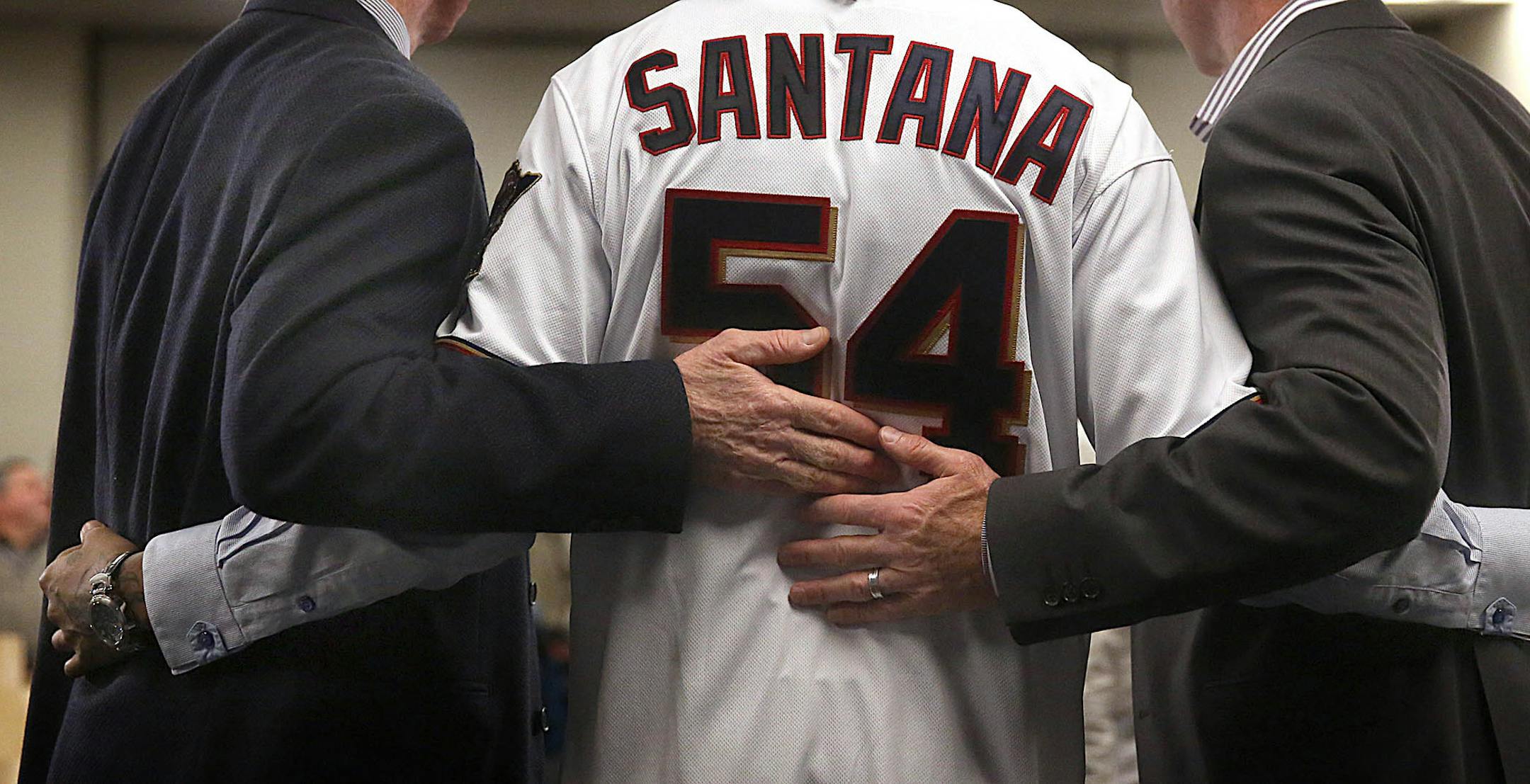 New Minnesota Twins pitcher Ervin Santana posed for photographs with general manager Terry Ryan (left) and manager Paul Molitor.] JIM GEHRZ ‚Ä¢ james.gehrz@startribune.com / Minneapolis, MN / December 13, 2014 /10:00 AM ‚Äì BACKGROUND INFORMATION: New Minnesota Twins pitcher Ervin Santana was introduced during a news conference at Target Field. Also appearing at the press conference were: Terry Ryan, Twins General Manager, manager Paul Molitor and Santana‚