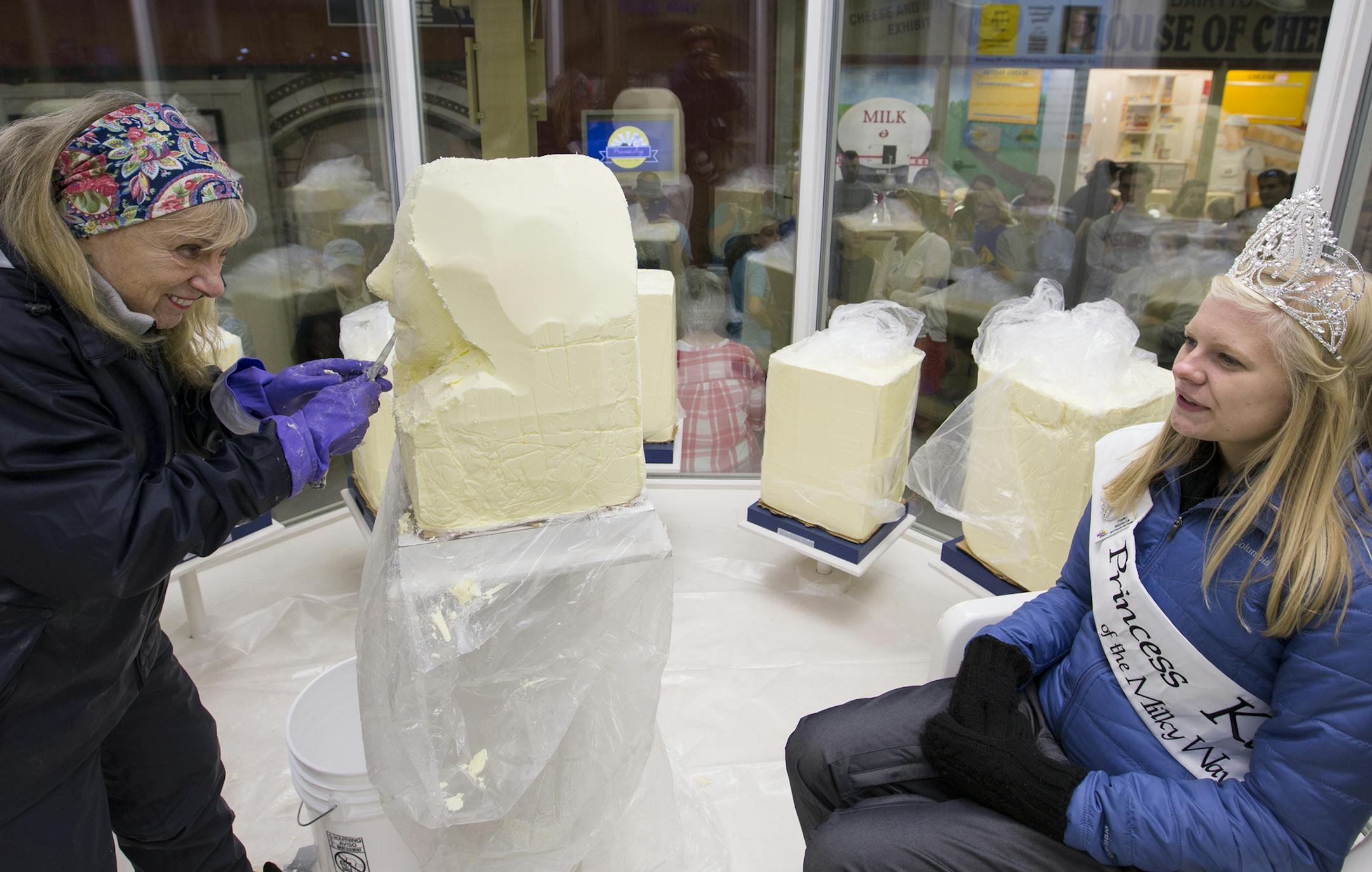 Linda Christensen sculpts the likeness of Haley Hinrichs, the 2016 Princess Kay of the Milky Way, in a block of butter inside the Dairy Barn. Christensen has been sculpting Princess Kays out of butter for 45 years. ] (Leila Navidi/Star Tribune) leila.navidi@startribune.com BACKGROUND INFORMATION: The Minnesota State Fair on Thursday, August 25, 2016.