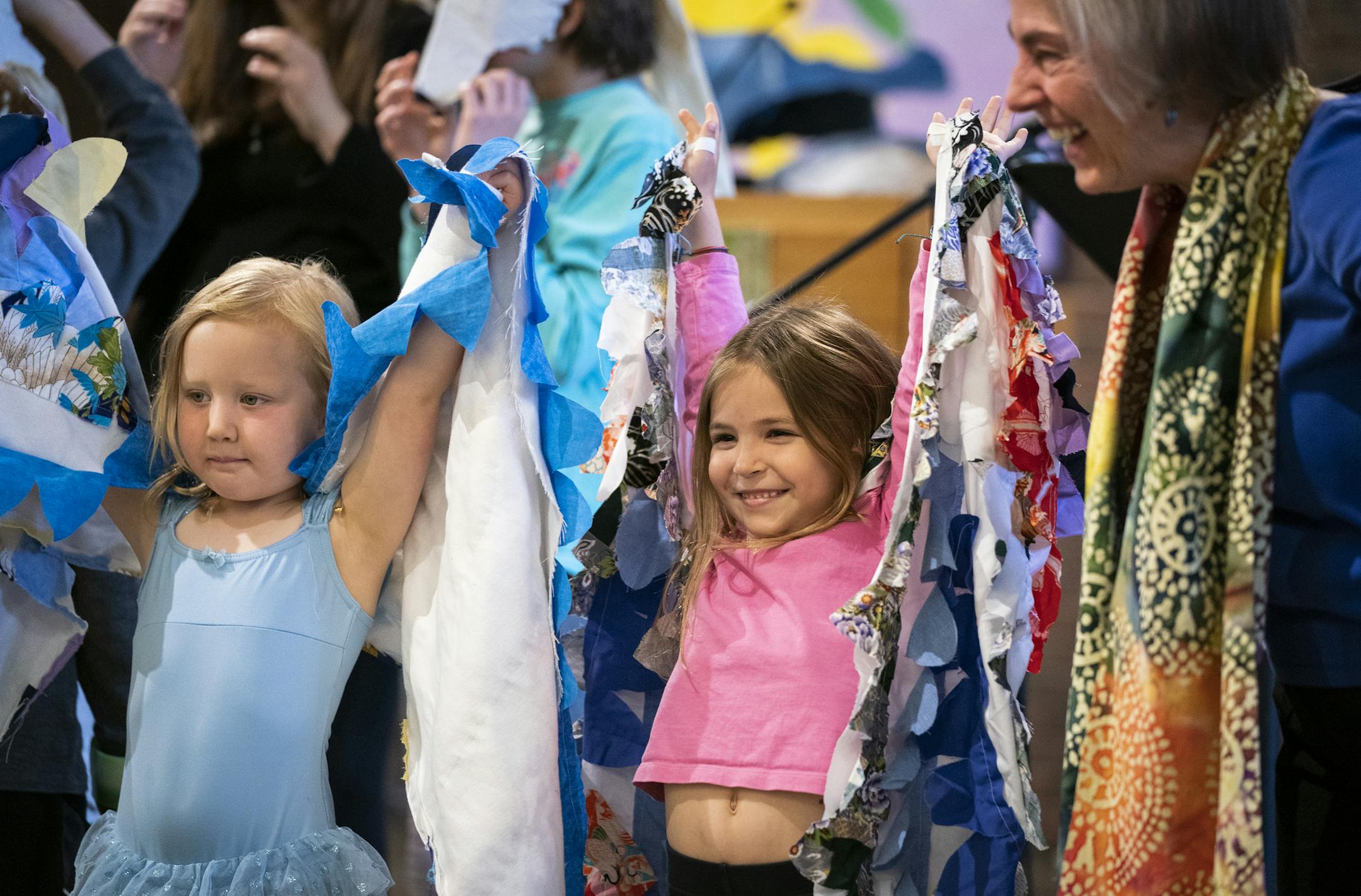 Claire Whitney, left, 4, and Kaiya Winters, 5, perform as birds during the Missa Gaia Earth Mass. ] LEILA NAVIDI ¥ leila.navidi@startribune.com BACKGROUND INFORMATION: Missa Gaia Earth Mass at St. Luke Presbyterian Church in Minnetonka on Sunday, May 19, 2019.