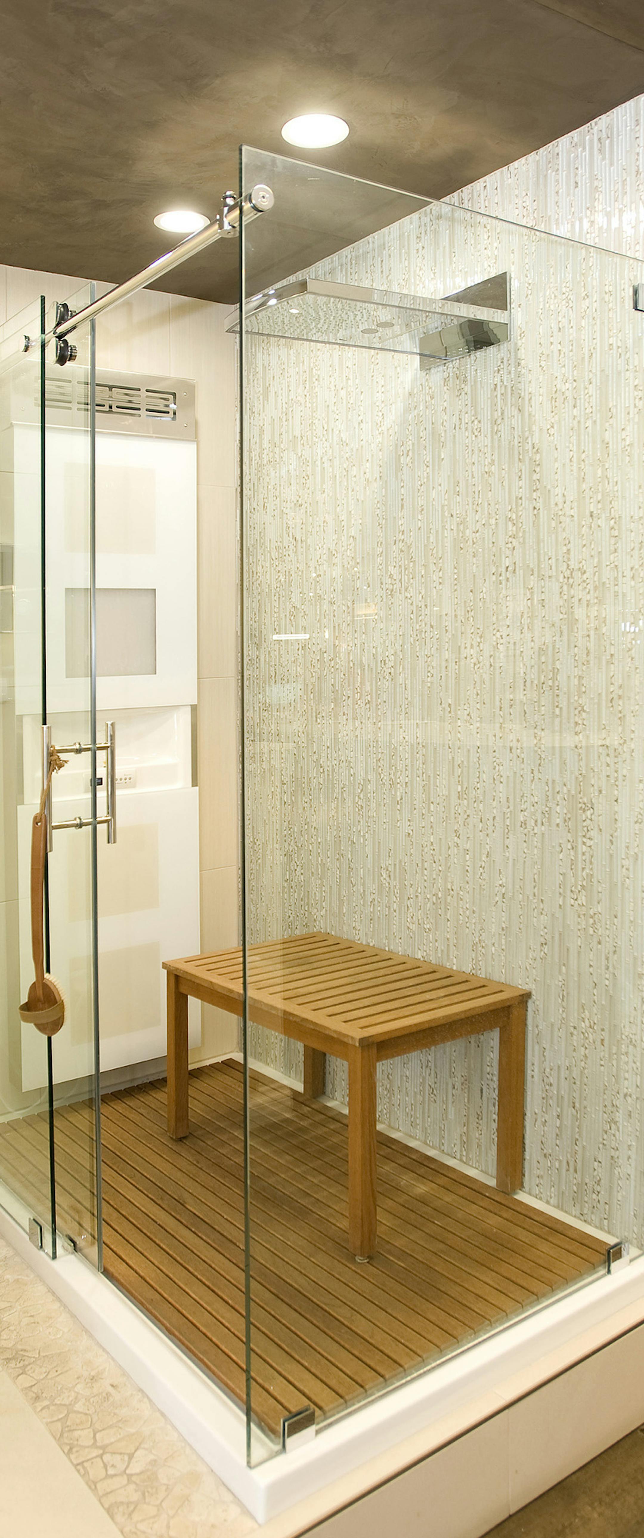 A glass enclosed shower on display at Faucets n' Fixtures in Orange, Calif. (Nick Koon/Orange County Register/TNS) ORG XMIT: 1181063